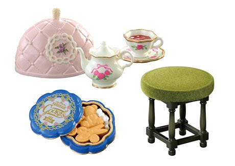 Grandma's Sewing Room Re-ment Blind Box Series: miniature tea set with pink quilted cozy, rose-patterned teapot, teacup, and blue tin of flower-shaped cookies.
