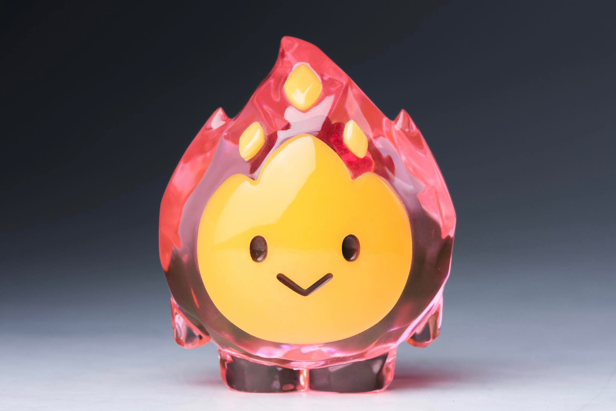 FLAMEY FROST by MUPA Toy: A 7cm translucent red flame figurine with a cartoon face, available for preorder, limited to 100 pieces.