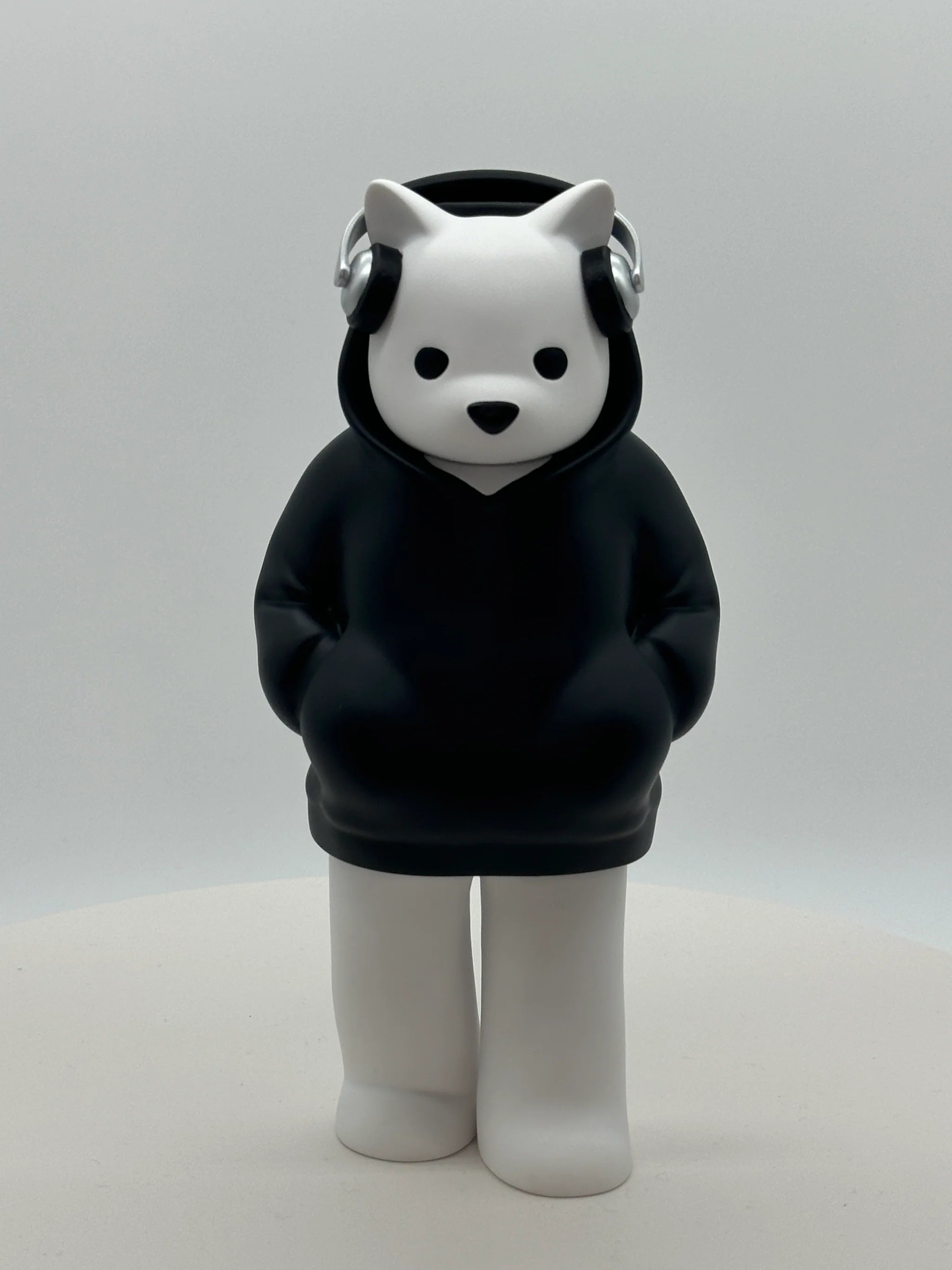 Low Fidelity by Luke Chueh: a 7-inch vinyl toy panda in a black hoodie, capturing solitude, inspired by lofi music, sculpted by Dave Bondi.