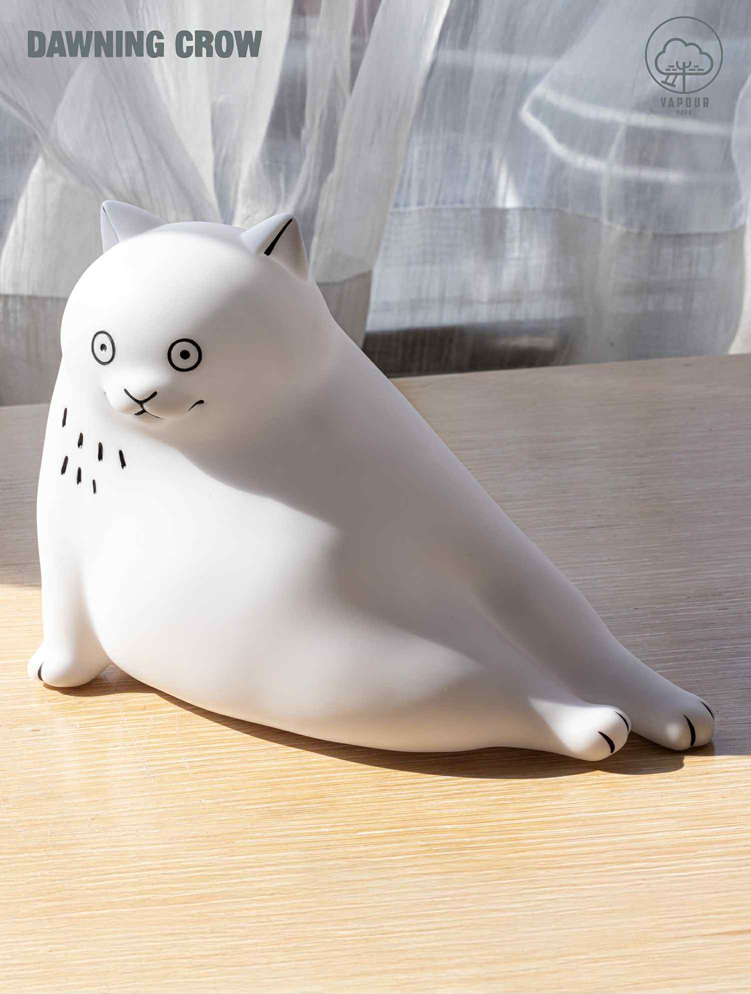 THE BIG WHITE CAT with LAMP by DAWNING CROW - Preorder. A 17cm PVC cat-like sculpture with simple features, stretched out on a tabletop.