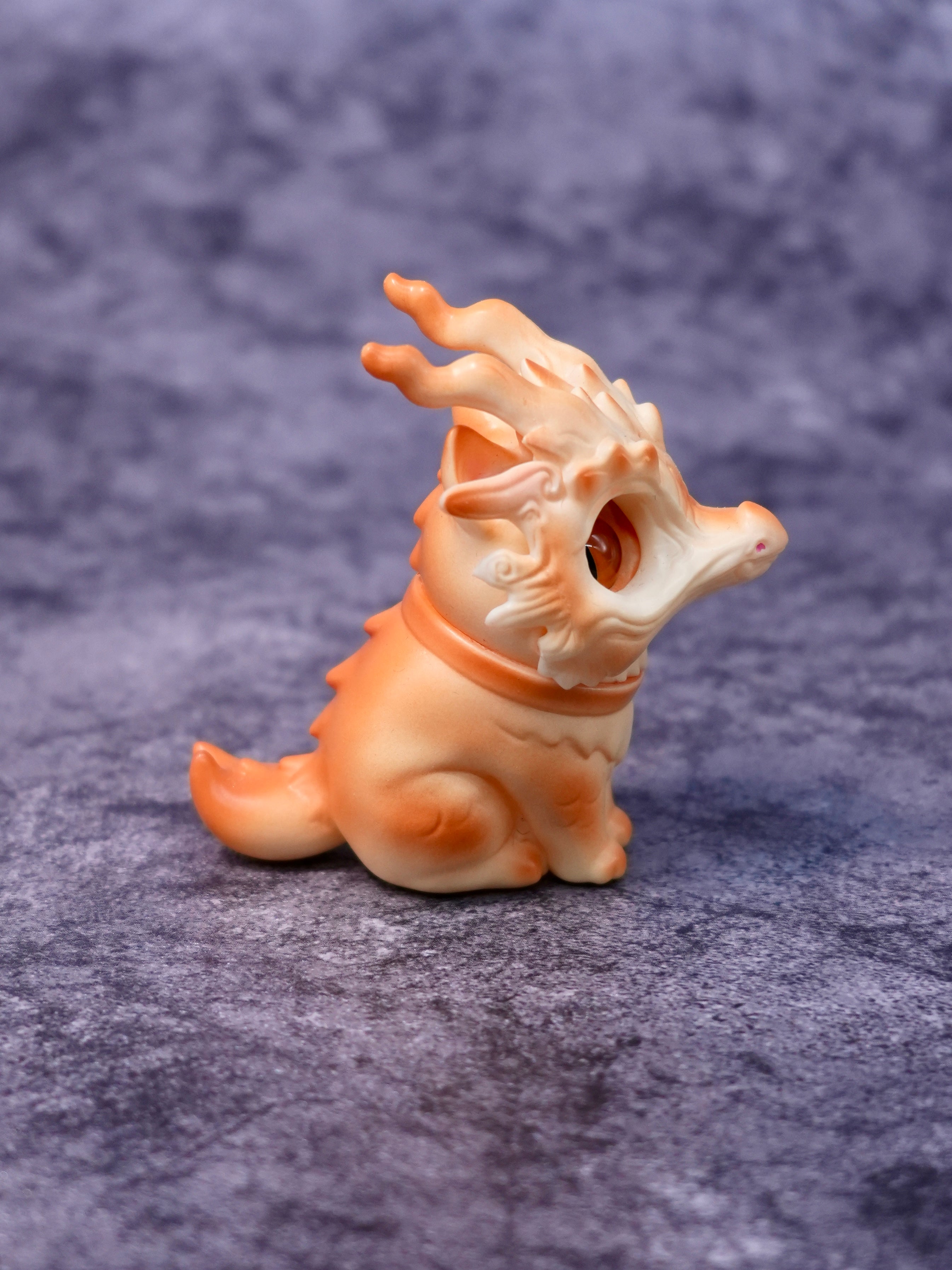 Baker Loong cat by HOTRU, a 6.5cm dragon-cat figurine with rotatable head and magnetic mask, in soft vinyl and resin. Preorder for May 2026.