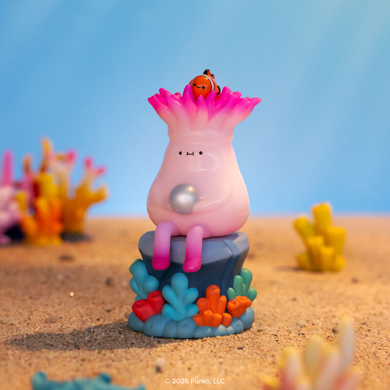 Funko vinyl figure of a pink anemone creature from Blonks Animal Afternoon Premium Blind Box, holding a pearl with a clownfish, designed by Sad Salesman.