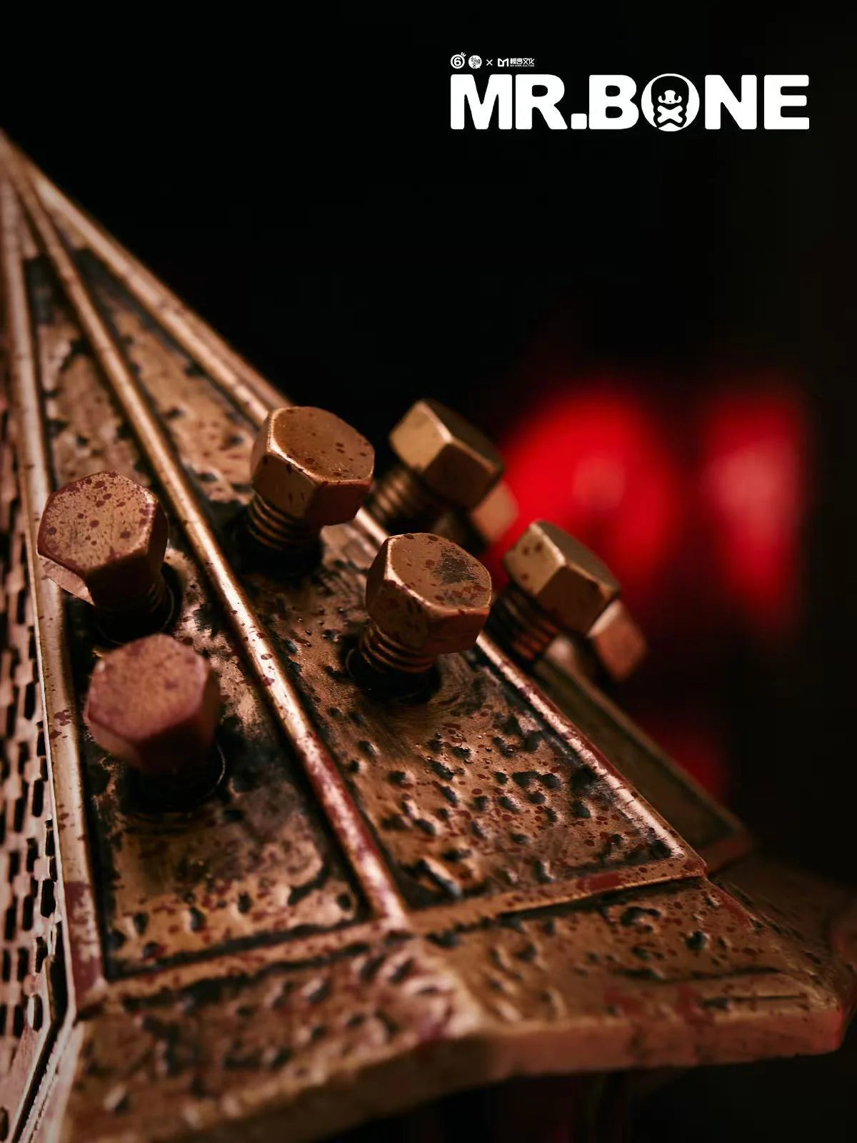 Mr. Bone - Pyramid Head 200% Preorder: Close-up of weathered metal plate with six rusty bolts, reflecting the Silent Hill-inspired art toy's rugged aesthetic.