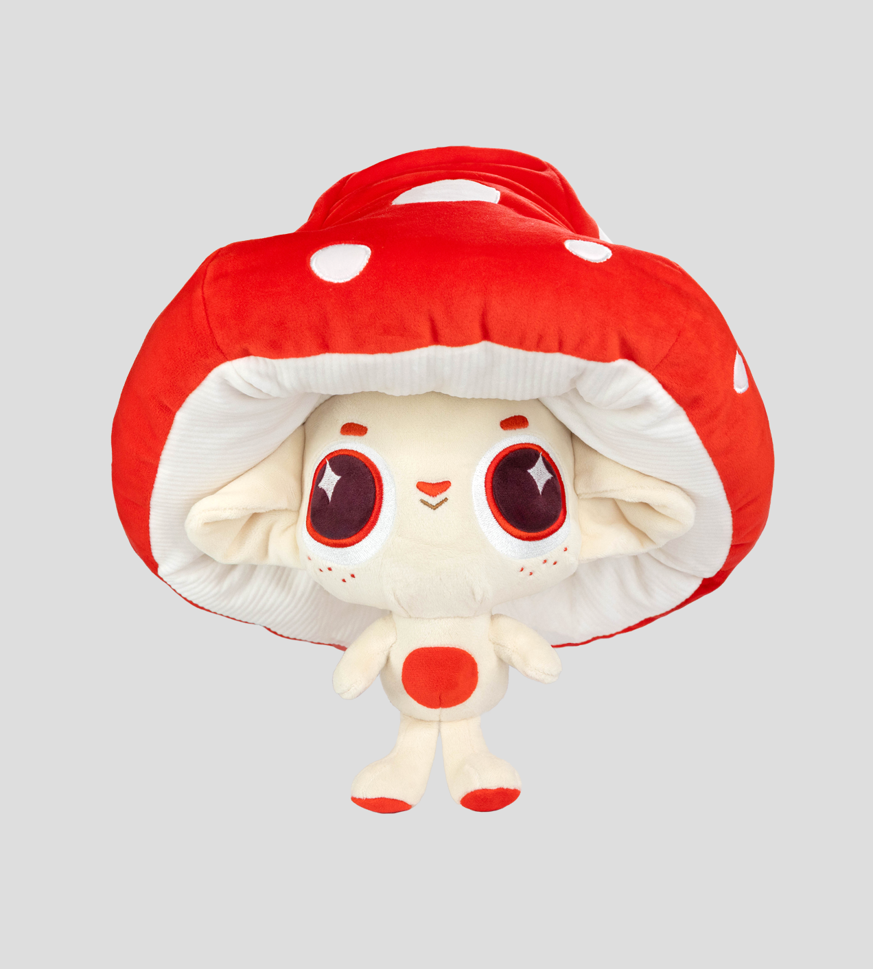 Capkins Peek-A-Boo Plush: Plush toy of Fly, a cartoon creature with a red mushroom cap, oversized sparkly eyes, and tuckable body.
