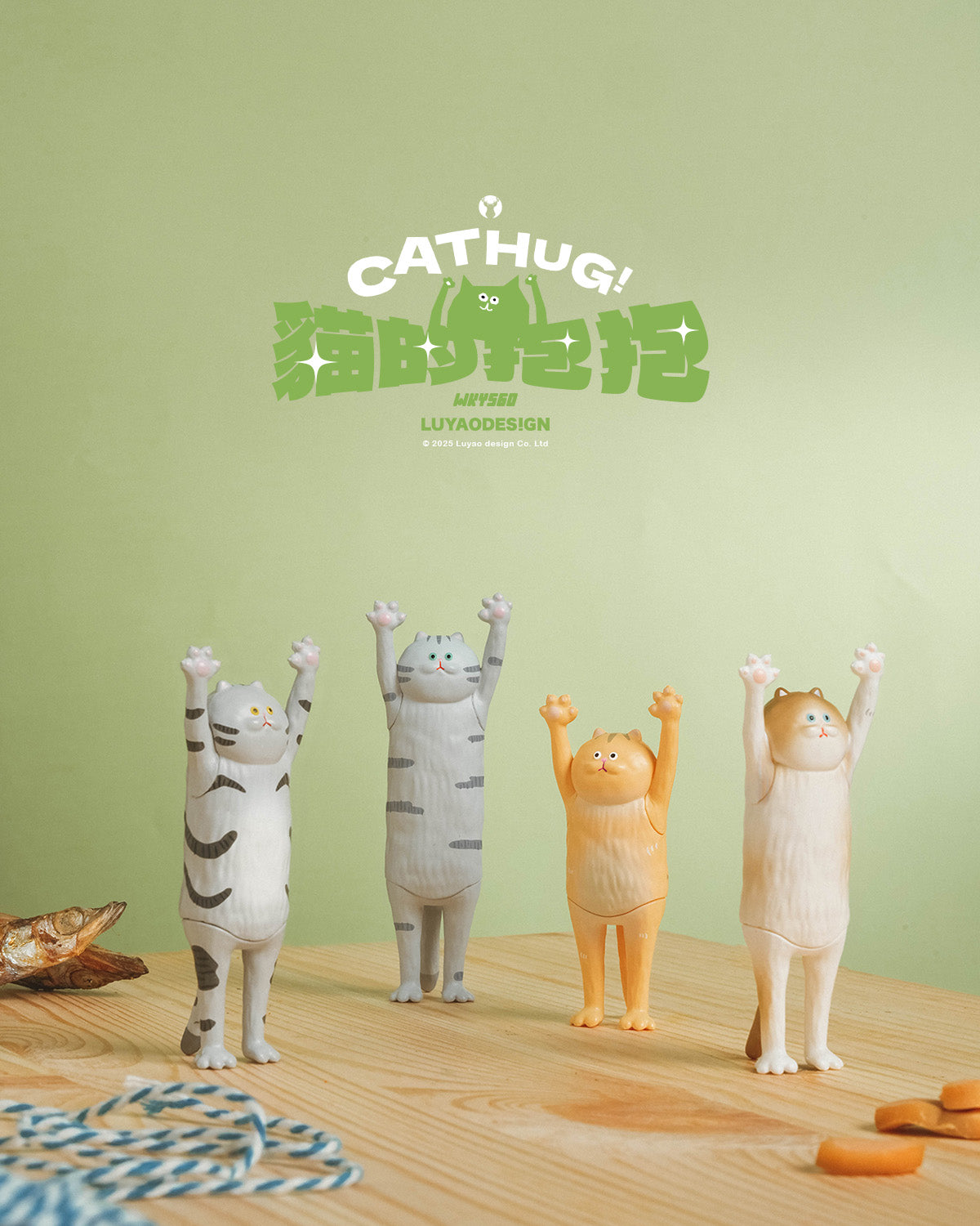 Four Cathug! cat figurines from LuyaoDesign's Cat Hug Blind Box Series stand on a table, showcasing diverse colors and playful poses.