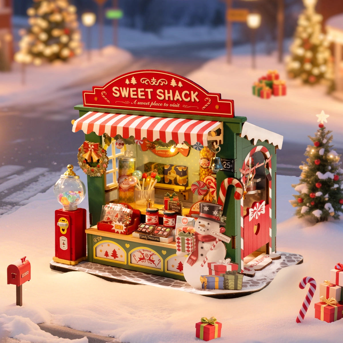 Rolife DIY Miniature House - Christmas Candy Stand DS043: A festive kiosk with sweets, a snowman cut-out, and holiday decor, perfect for seasonal display.