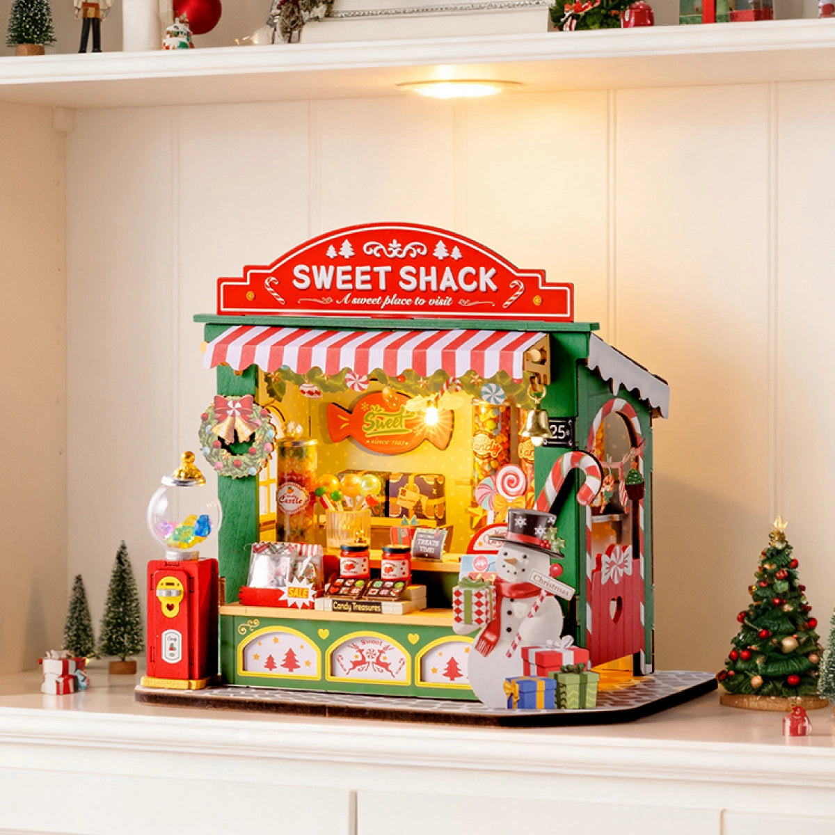 Rolife DIY Miniature House - Christmas Candy Stand DS043: A festive diorama featuring a holiday-themed candy stall with miniature details for seasonal decor.