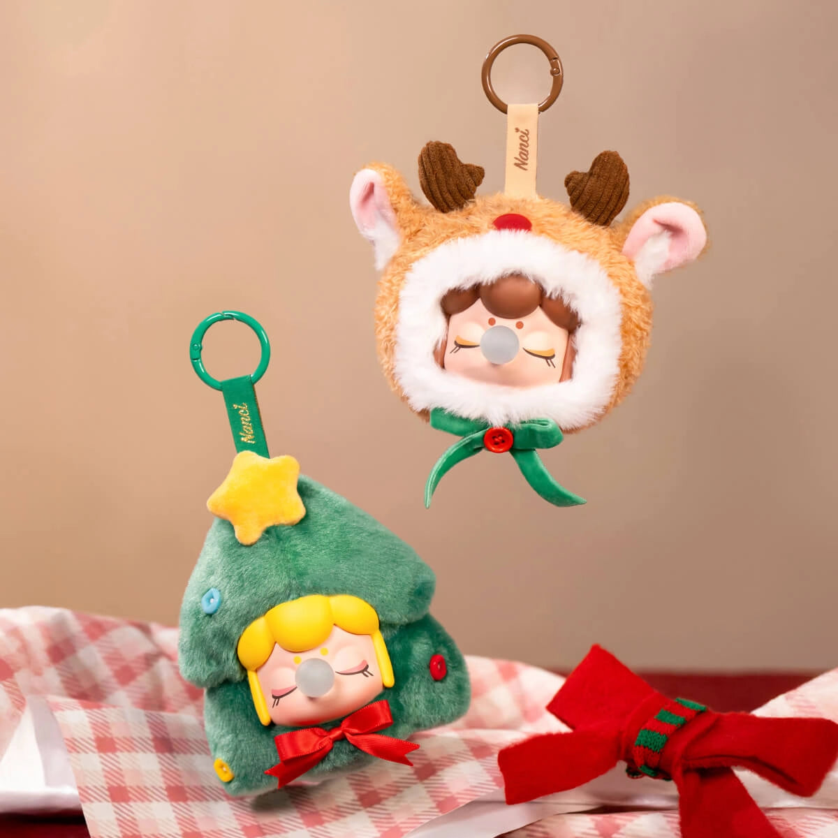 Rolife Nanci's Christmas Gift Plush Pendants feature holiday-themed characters as keychain ornaments, perfect for festive decoration or bag charm.