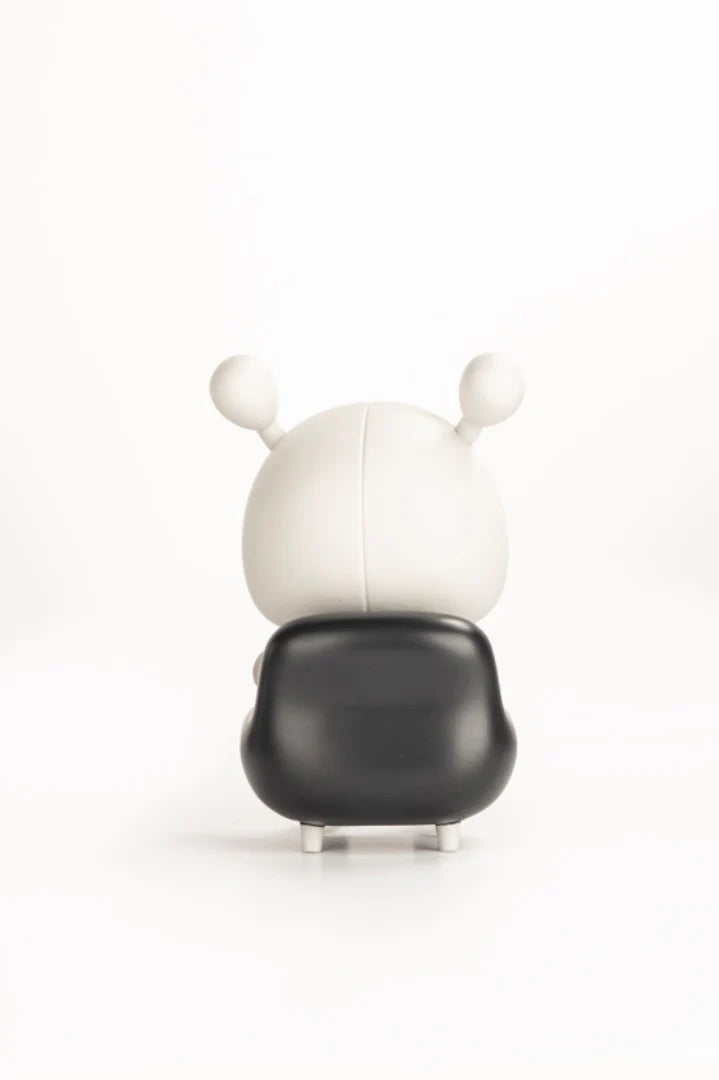 Napa - Retro: A designer toy with a matte-white head and black glossy torso, inspired by classic animation, limited edition from Strangecat Toys.