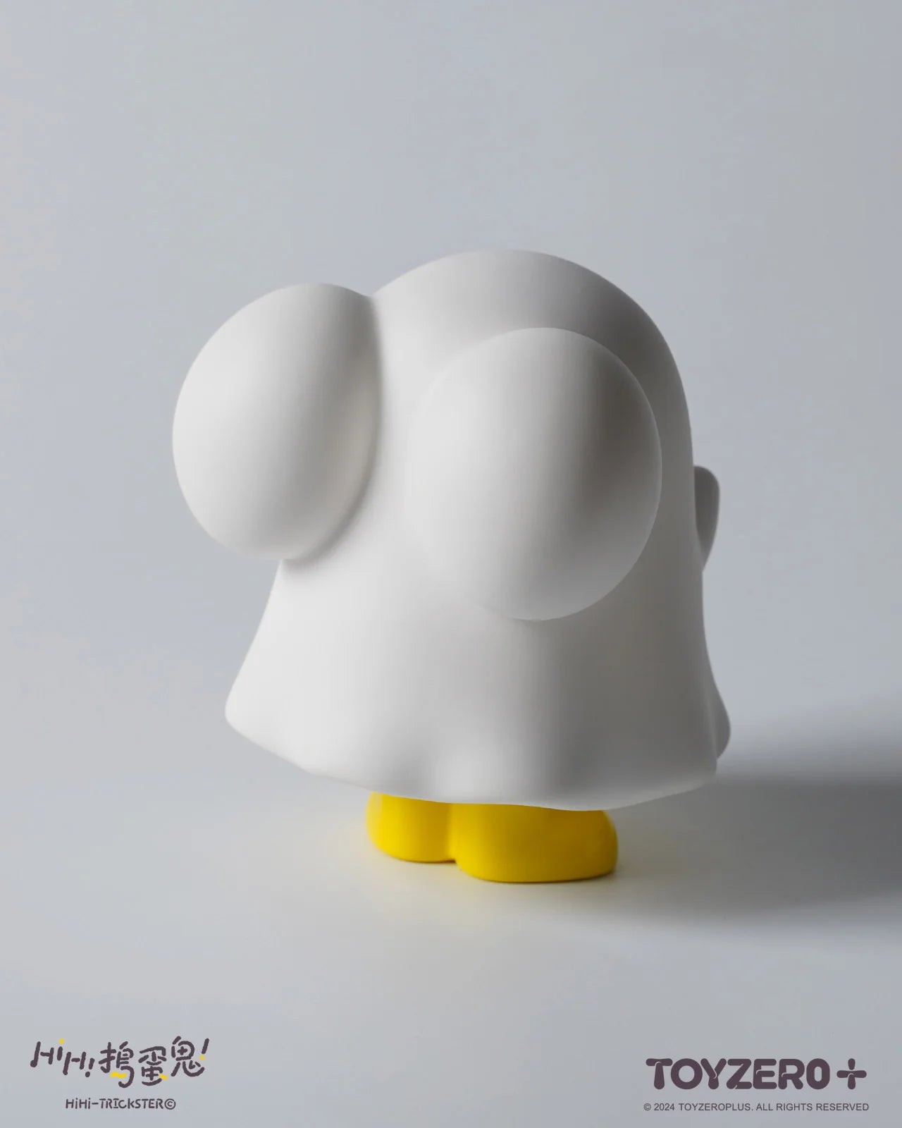 Alt text: HiHi Trickster - Original ver. toy, a white figure with yellow legs, 10cm tall, made of soft vinyl.