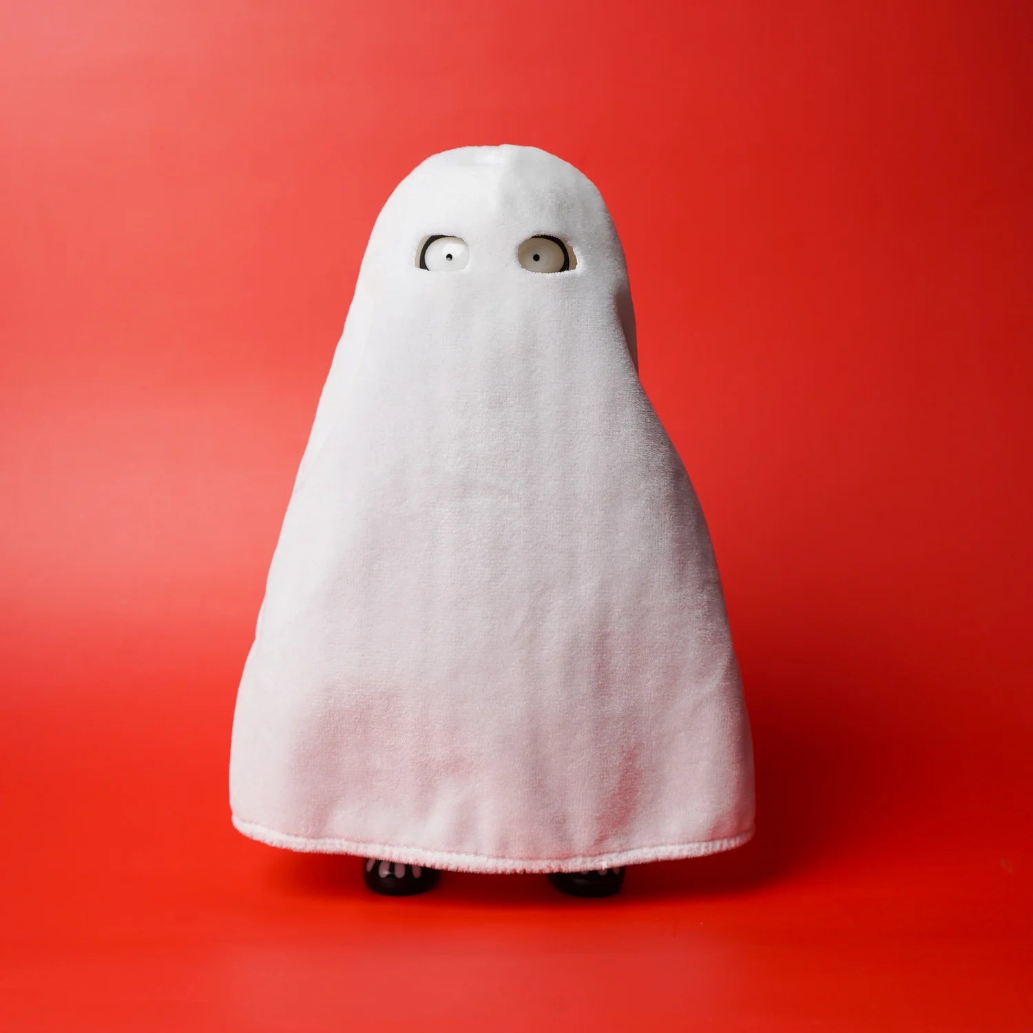 Mr. Nobodies - Skeleton (GID Green) figurine under a ghostly sheet, featuring cut-out eye holes and tiny feet, designed by Nurfadli Mursyid.