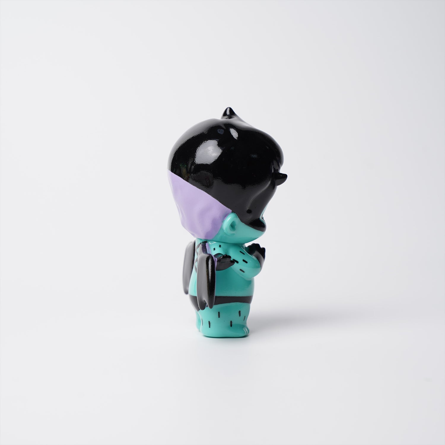 THE INSPECTOR DEDE BY ABAO vinyl collectible with turquoise body, black wings, and two-tone hair, standing upright. Preorder for April 2026.