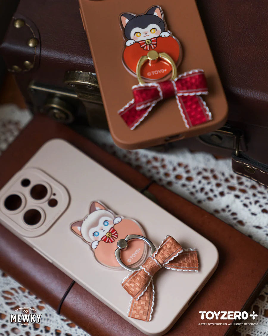 Moffy's - Mewky Phone Ring Holder features cartoon cat grips on smartphones, showcasing Toyzero+'s whimsical design with chibi cats and heart shapes.