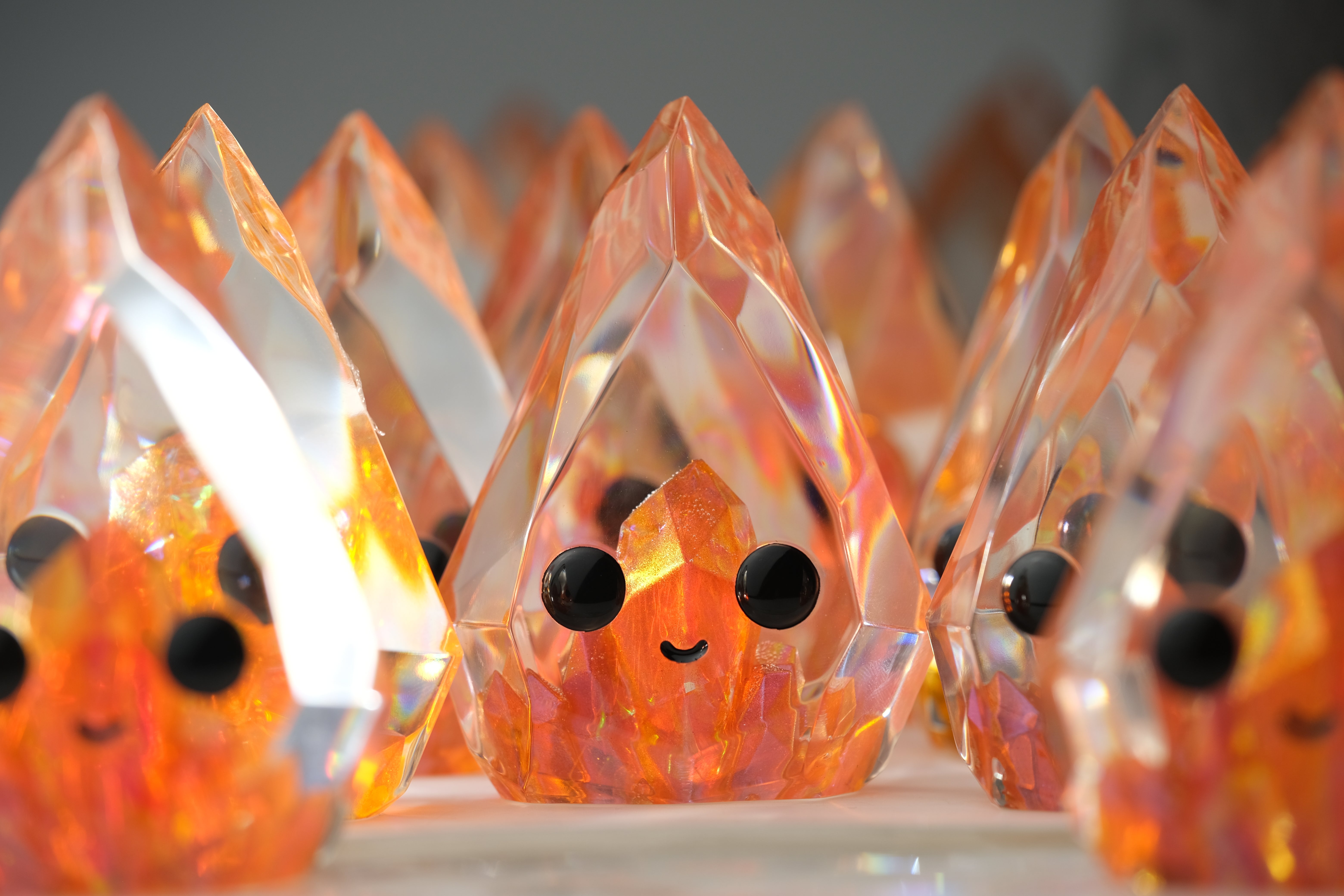 Fire Opal Prismite by Yutoos, a 3.5 resin art toy, showcases intricate crystal-like details, limited to an edition of 50.