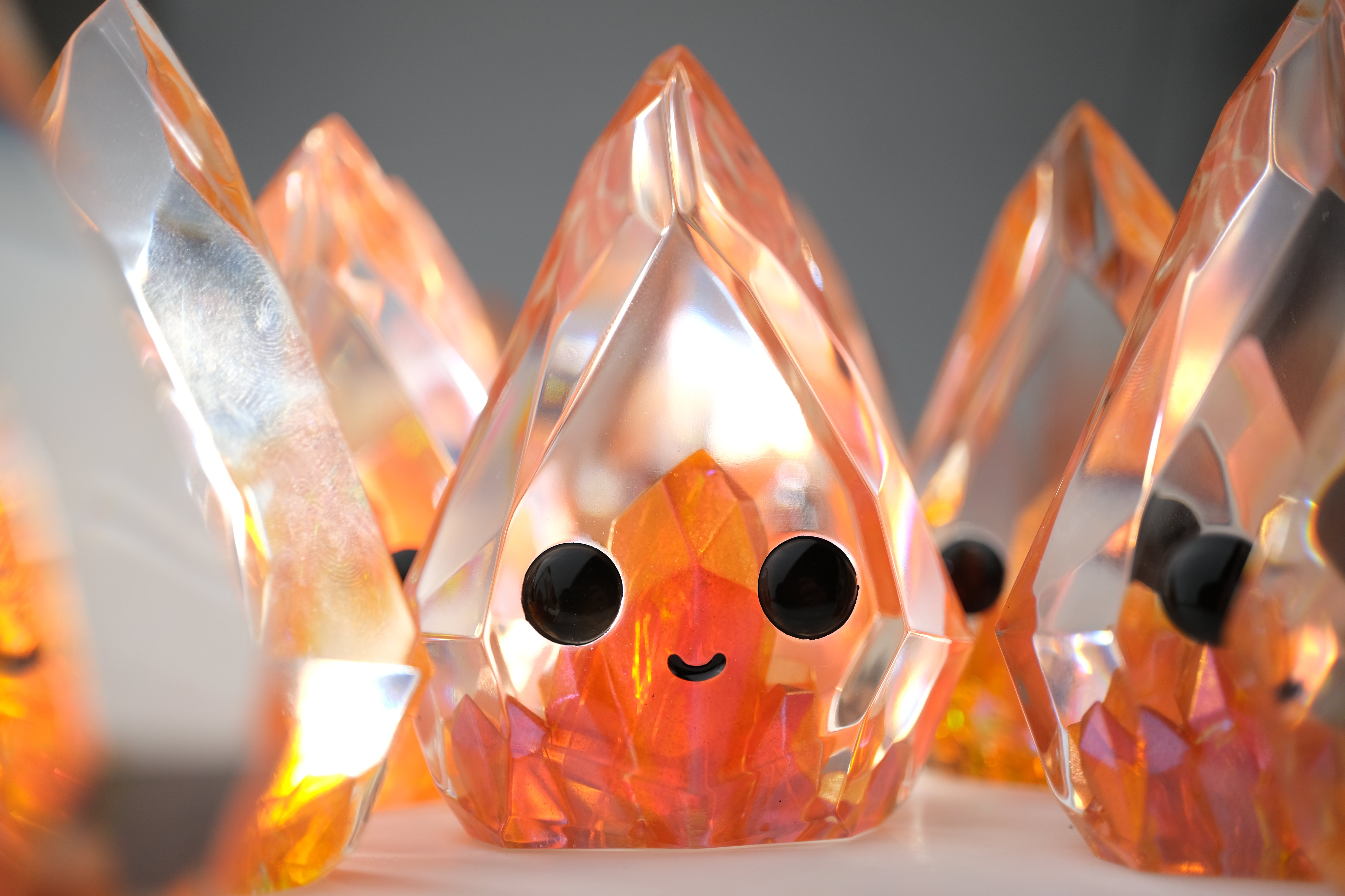 Fire Opal Prismite by Yutoos, a 3.5 resin art toy with fingerprint-like textures, limited edition of 50.