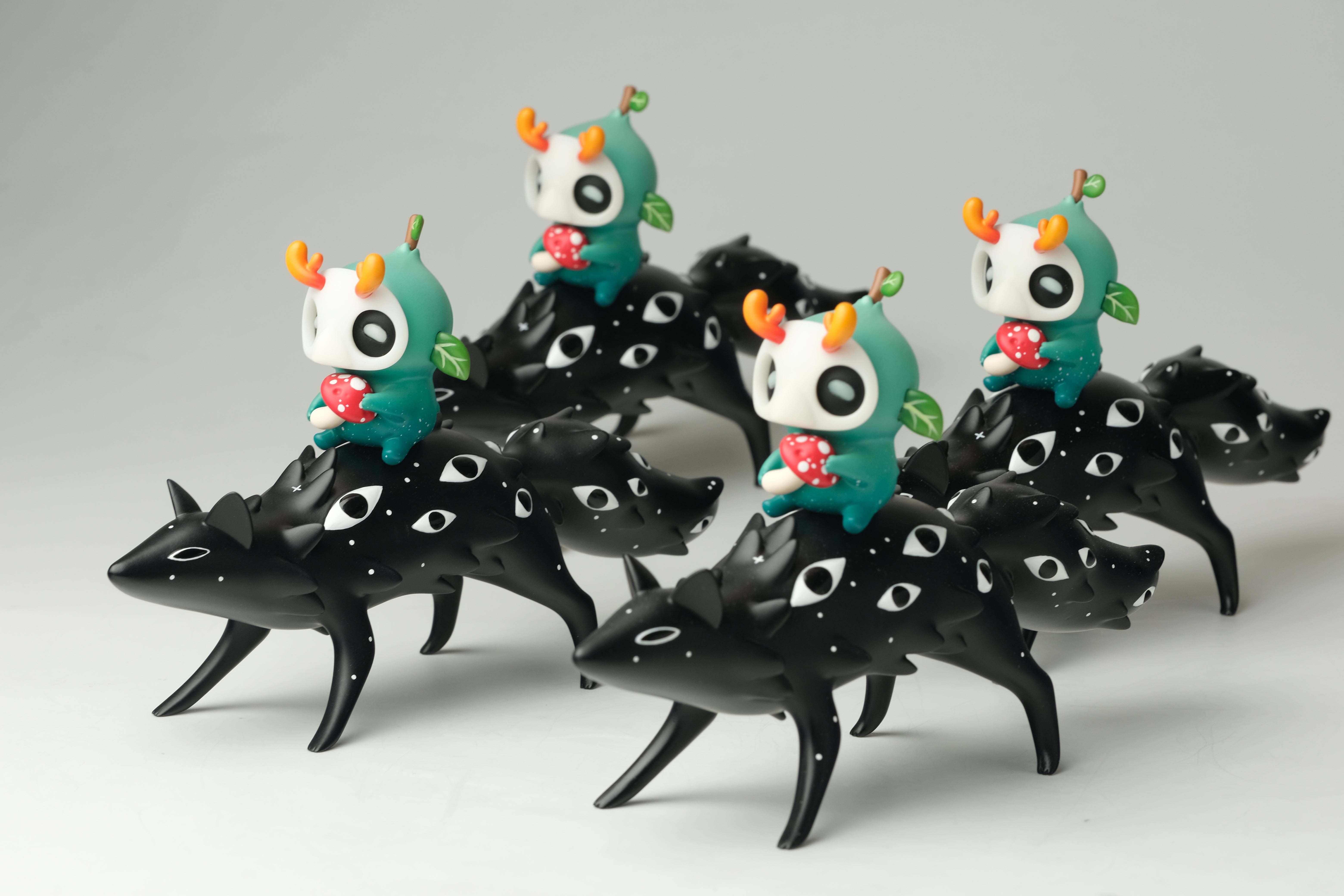 Oracle & Muffin by Faunwood x Madkids: Four teal-hooded vinyl figures on black wolf-like beasts, limited edition resin, 7x4, exclusive to Strangecat Toys.