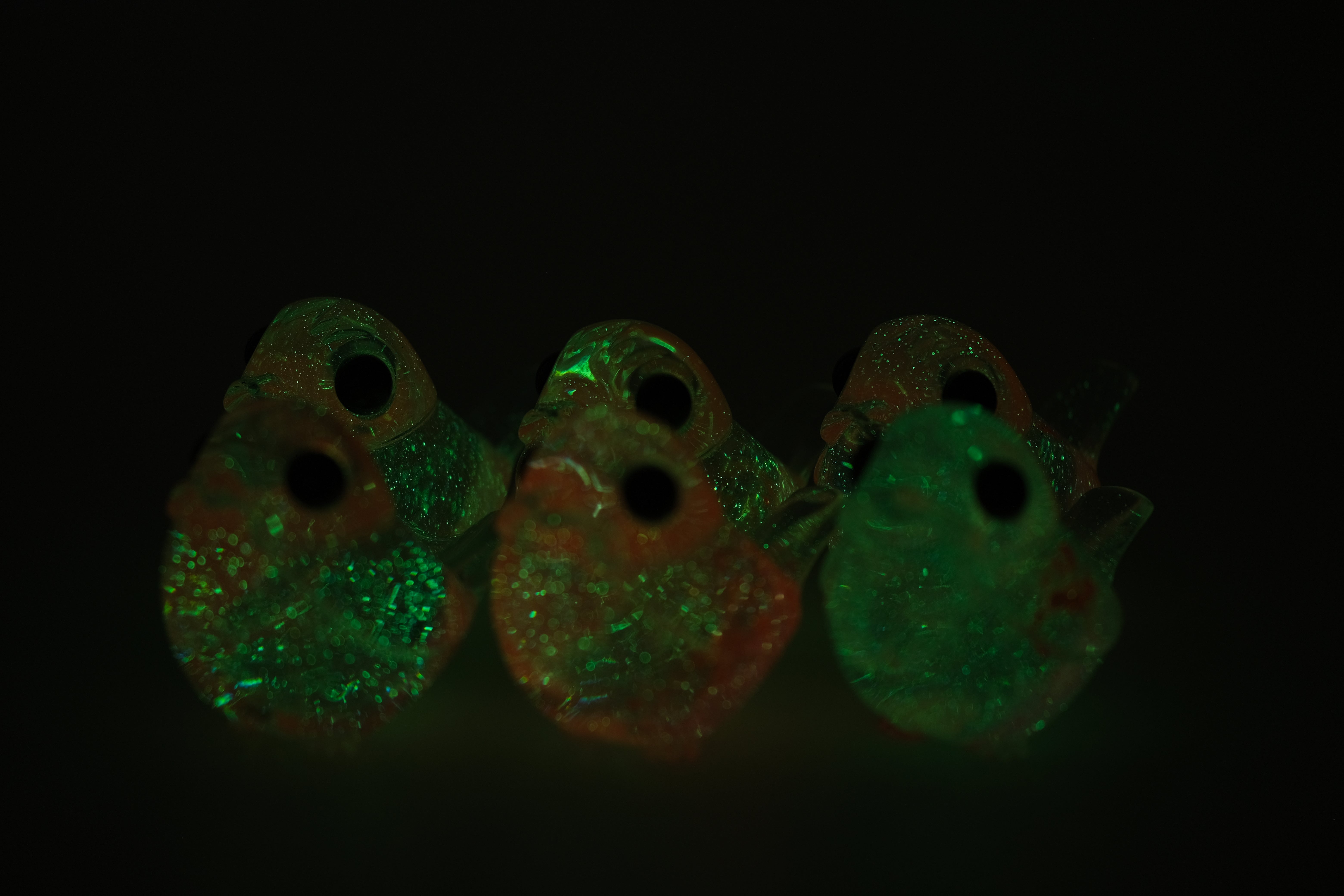 Pink Twinkle Robin by Muffin Man: five glowing, translucent glass bird figurines with glittery interiors, limited edition art toys.