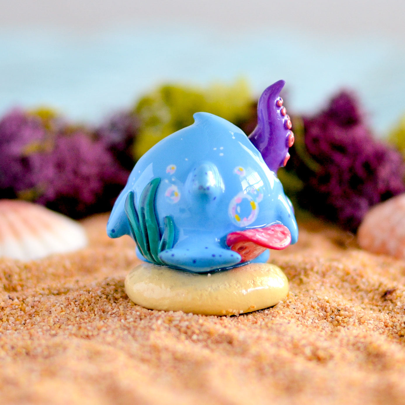 Little Shit Bigger Deal - Beasties Bites by Dear Beasties x Trash Panda: a 1.5 collectible toy, abstractly resembling a fish and cartoonish features. Limited edition, ships in 28 days.