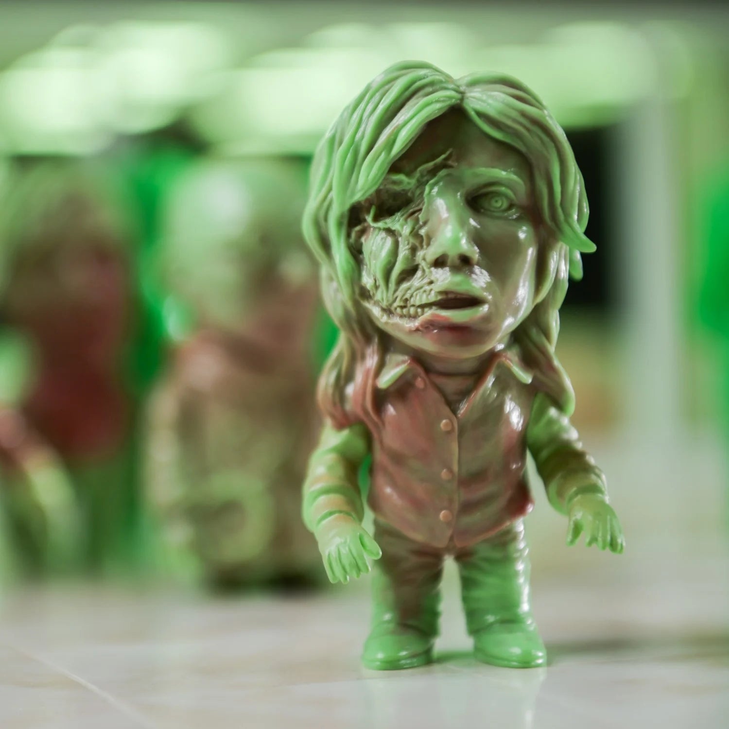 ZOMBI: DAWN OF THE DEAD Who Goes There Blind Box Series figurine, 6cm, depicting a stylized zombie with detailed decay, sculpted by Naoki Okamoto.