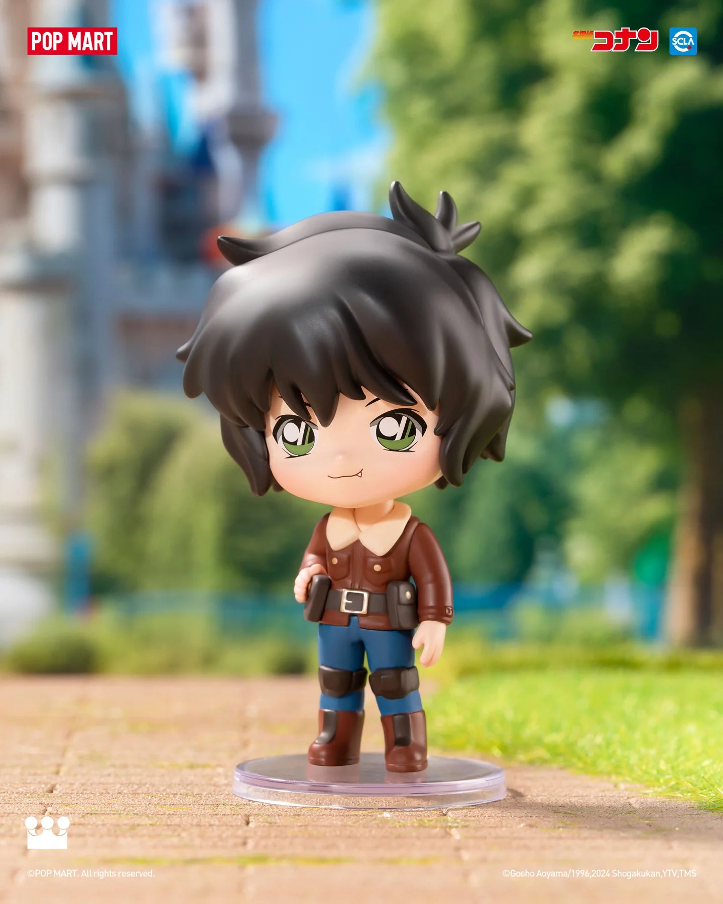 Detective Conan Carnival Blind Box Series: A toy figurine of a cartoon character on a plastic disc.