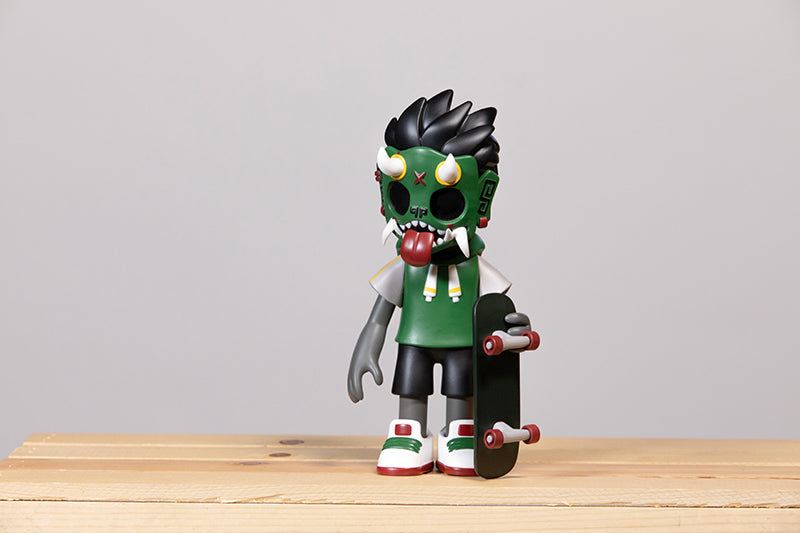 Toy figure with skateboard, limited edition Thrasher Goblin - Boba Edition by Chris Dokebi, includes skate deck and sticker pack.