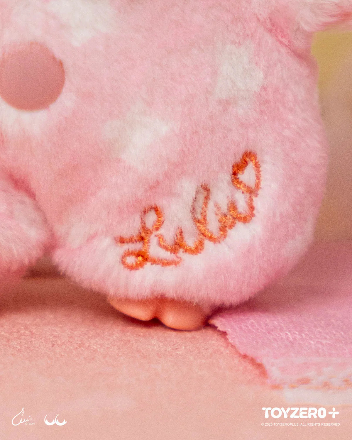 Close-up of LuLu the Piggy plush, featuring pink fluffy fabric and Lulu embroidery, part of LuLu's Dreaming Wonderland Series PVC Plush Keychain Blindbox.