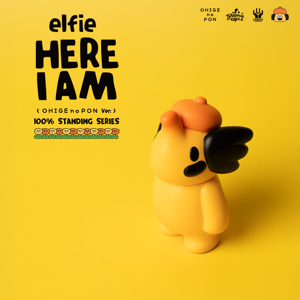 Collectible vinyl figure Elfie Here I Am! 100% OHIGEnoPON Edition featuring a chubby yellow character with black accents, part of the 100% Standing Series.