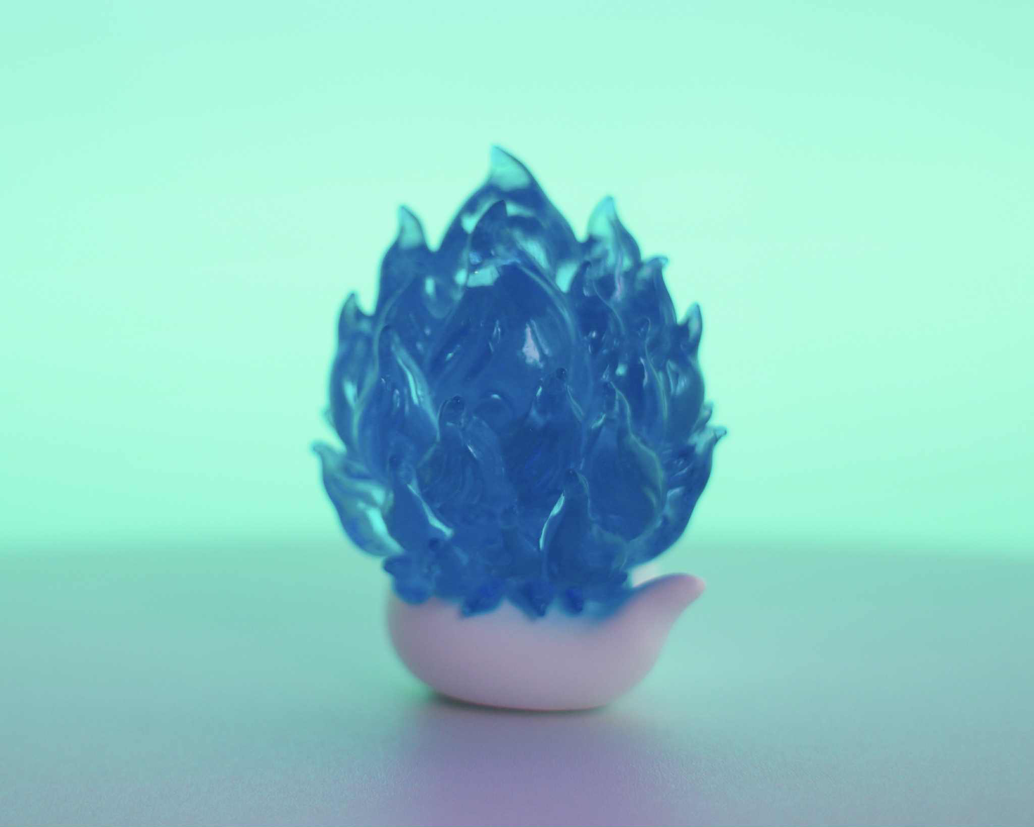 Soul Hogkey Blue Spirit by Tangent: A 9 cm translucent resin flame sculpture on a white base, set for preorder, shipping by November 2025.