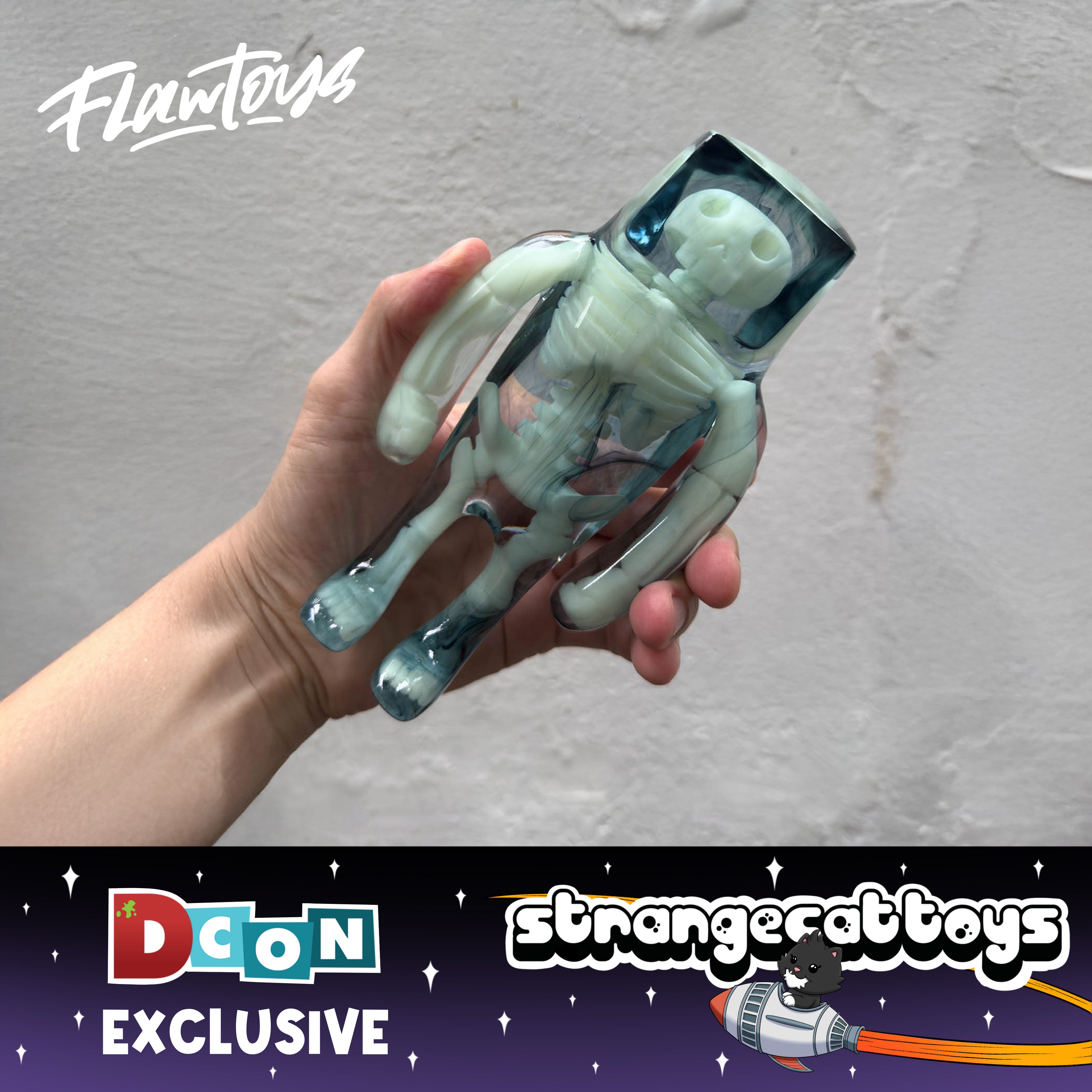 Anatoma Stranger by Flaw Toys: a translucent, glow-in-the-dark resin skeleton astronaut figurine, 7 tall, limited to 5 pieces, exclusive to DCon by Strange Cat Toys.