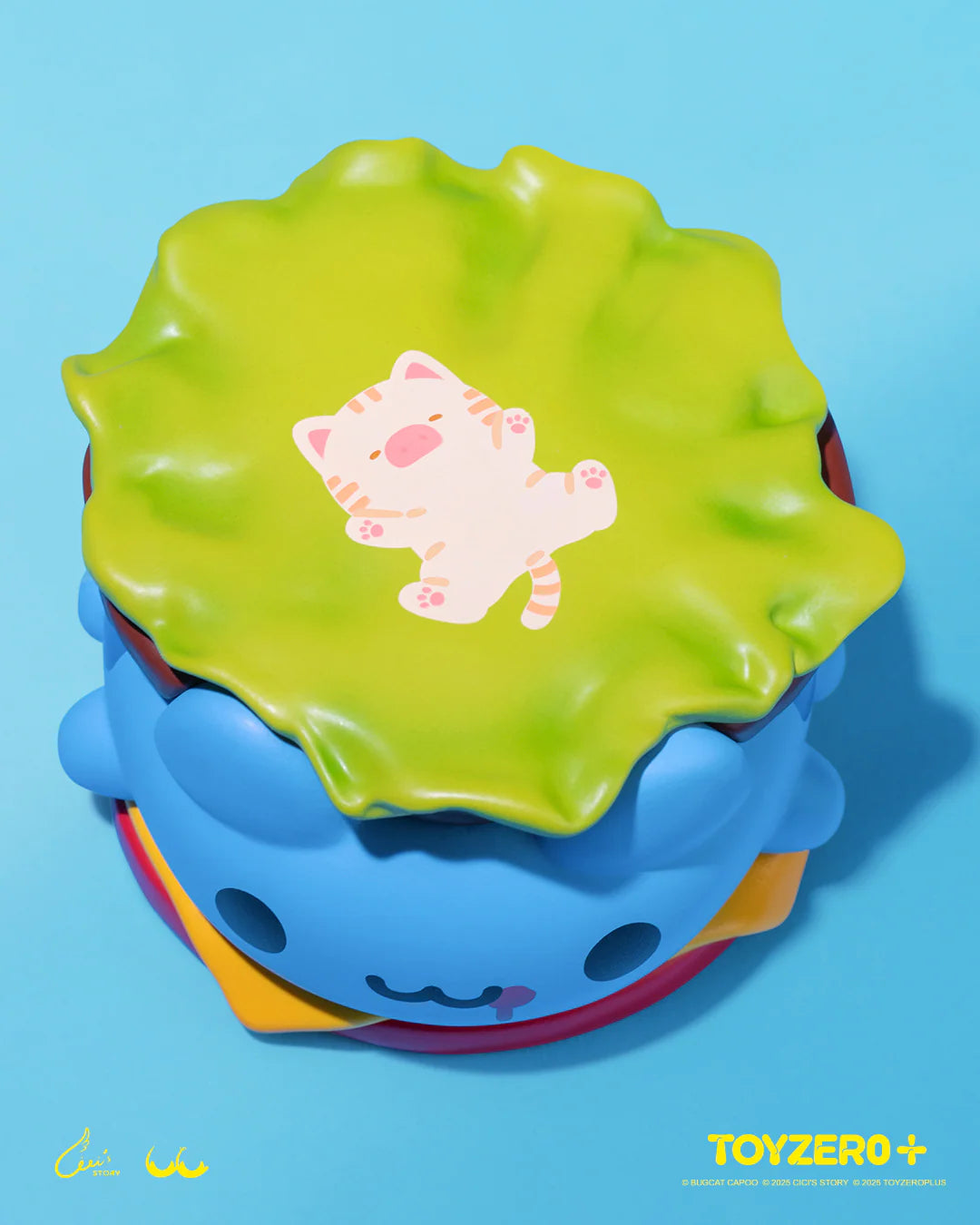 LuLu the Piggy x Capoo - LuLuBurger, a collectible toy with magnetic layers: kitty on lettuce, burger patty, bun face, cheese, and red base.