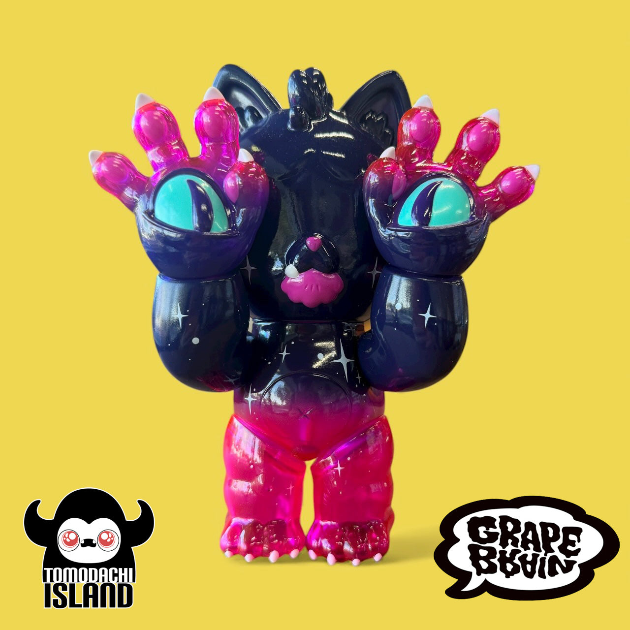 Cosmic Gramps, a 6-inch sofubi toy by Tomodachi Island x Grape Brain x Prime, featuring cat-like design with raised paws and vibrant, glossy color transitions.