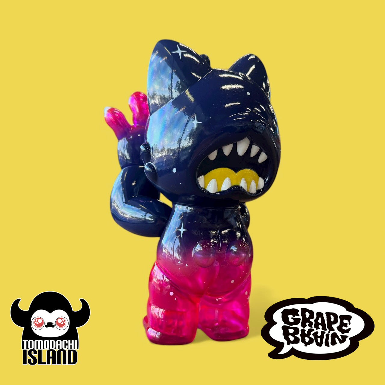 Cosmic Gramps by Tomodachi Island x Grape Brain x Prime, a 6-inch vinyl art toy with a starry top and translucent gradient bottom, featuring a toothy monster design.