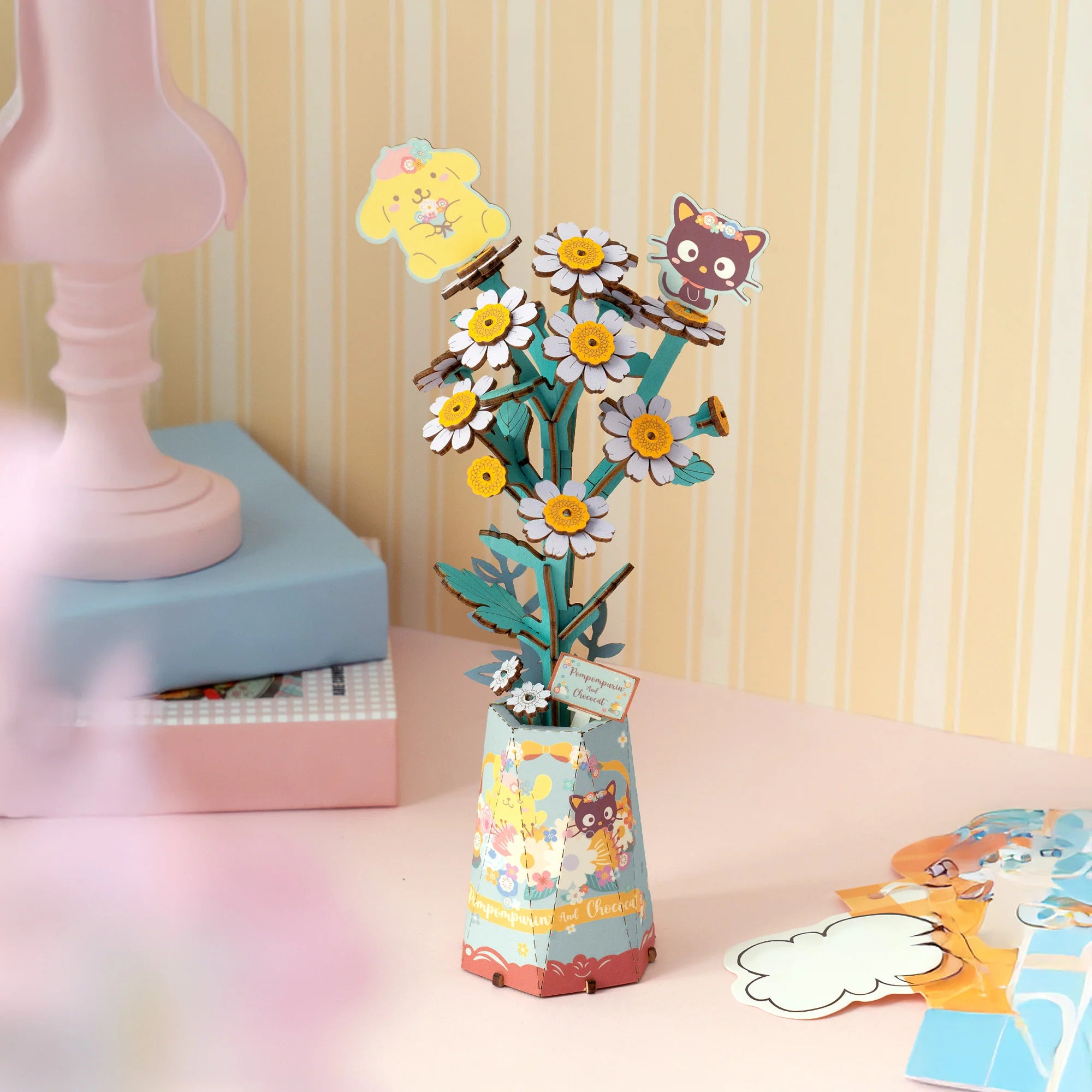 DIY wooden puzzle kit featuring Pompompurin and Chococat in a chamomile bouquet, perfect for creative Sanrio fans.