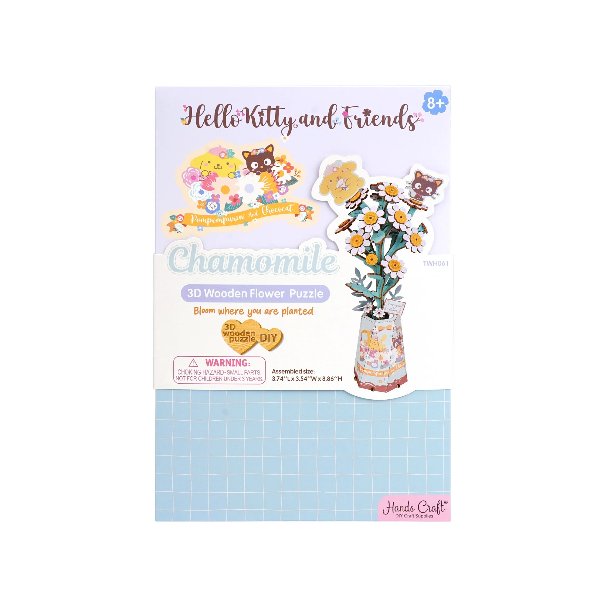 Front of 'Hello Kitty® and Friends Pompompurin & Chococat Chamomile' 3D wooden puzzle kit box for ages 8+, featuring a DIY vase of chamomile flowers.