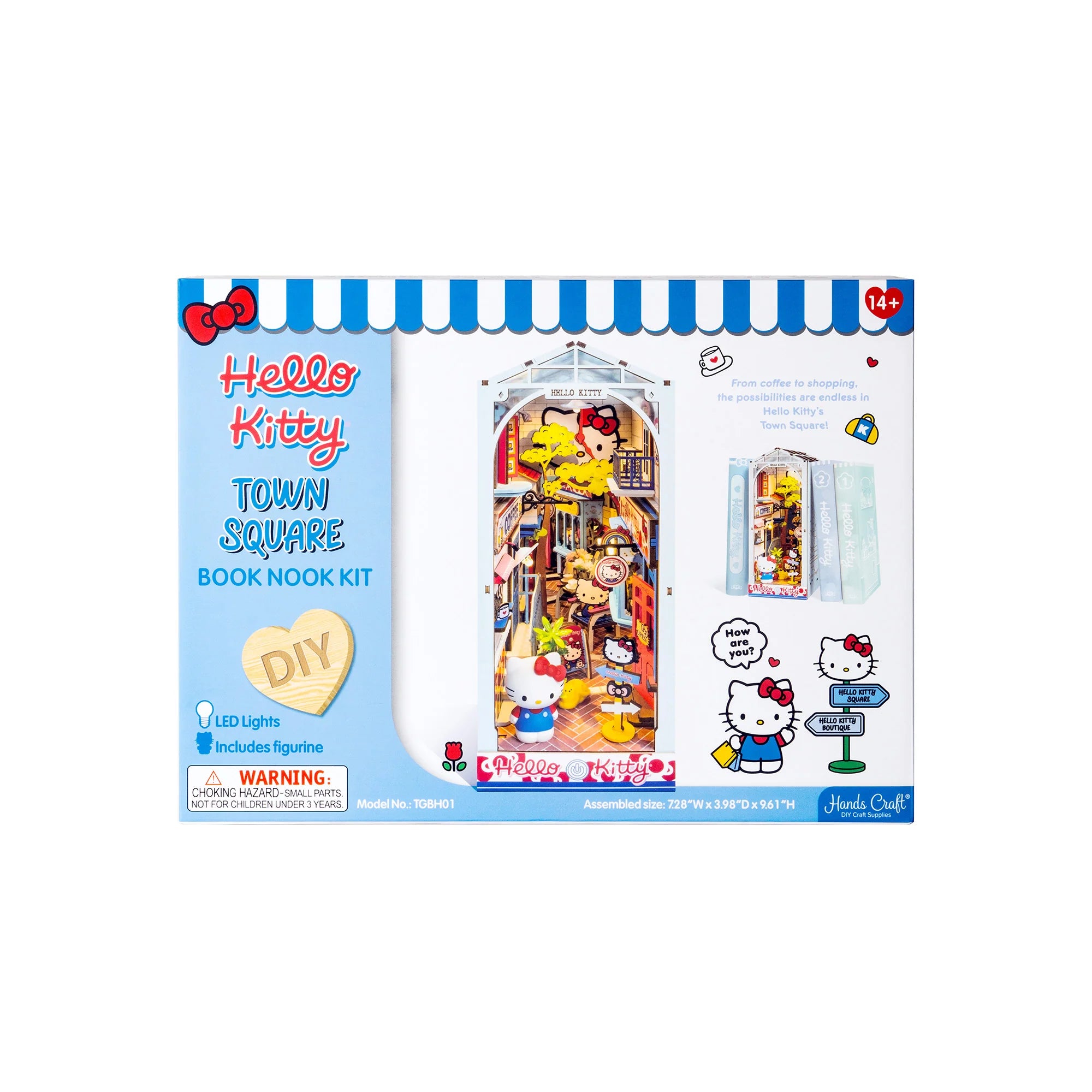 Hello Kitty® Town Square Booknook DIY kit featuring a miniature diorama with LED lights, storefronts, and Hello Kitty figurine for bookshelf display.