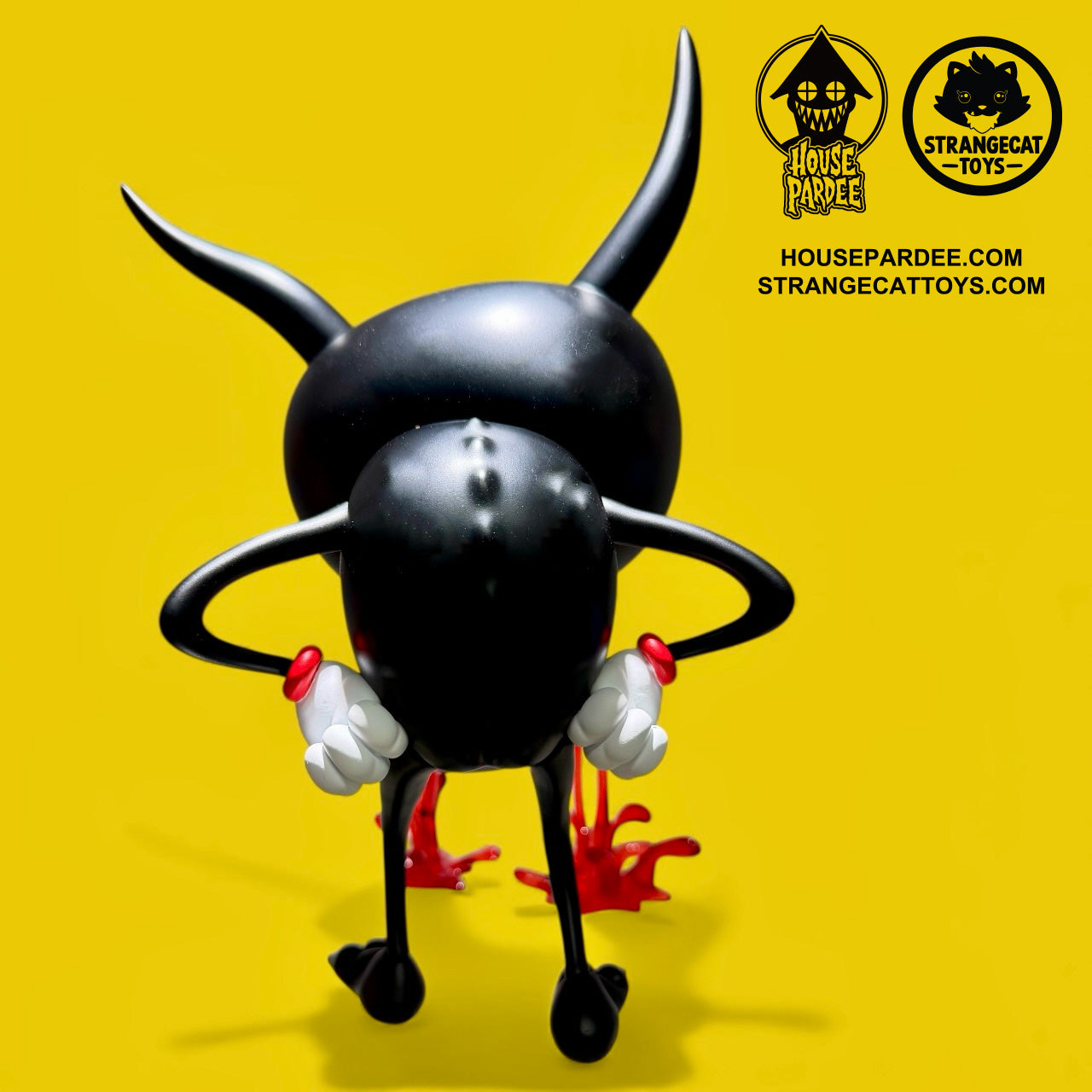 I Love My Job by Alex Pardee vinyl art-toy, matte black with horns and red liquid detail, limited edition of 250 pieces, featured by StrangeCat Toys.