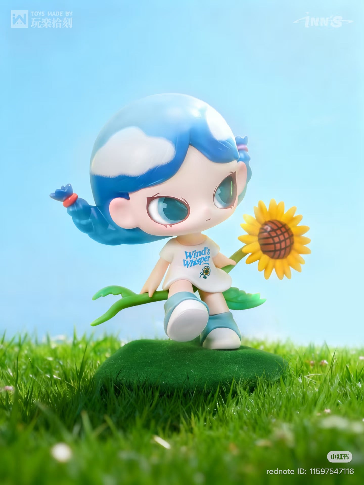 NN – I Heard It Series Blind Box collectible figure: blue-haired girl with sunflower on grassy mound, limited edition, artist-designed, PVC, 10cm.