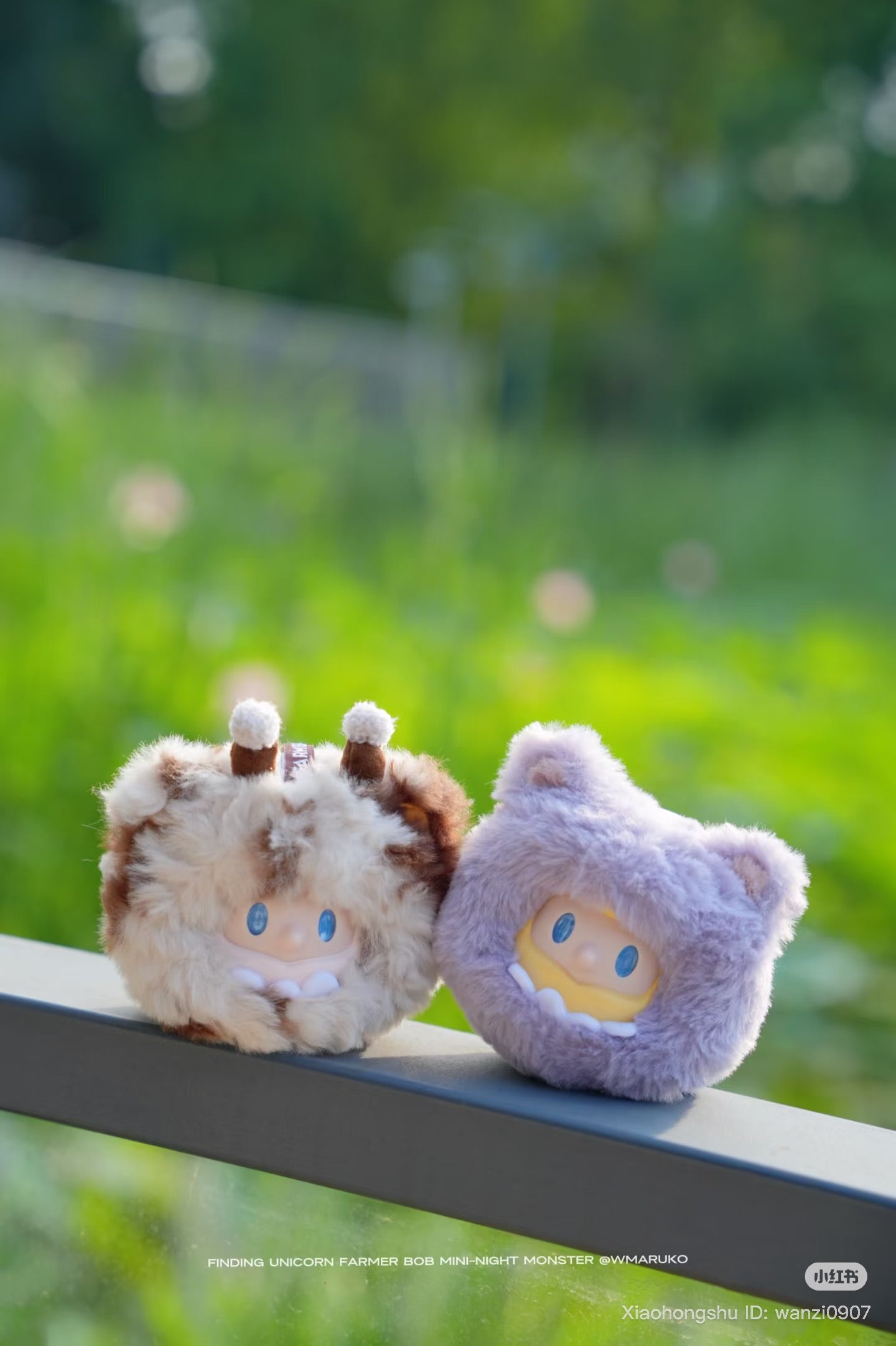 Farmer BOB MINI-NIGHT Monster figures, fluffy animal hoods with blue eyes, posed on a railing outdoors; preorder for Strangecat Toys' blind box collection.