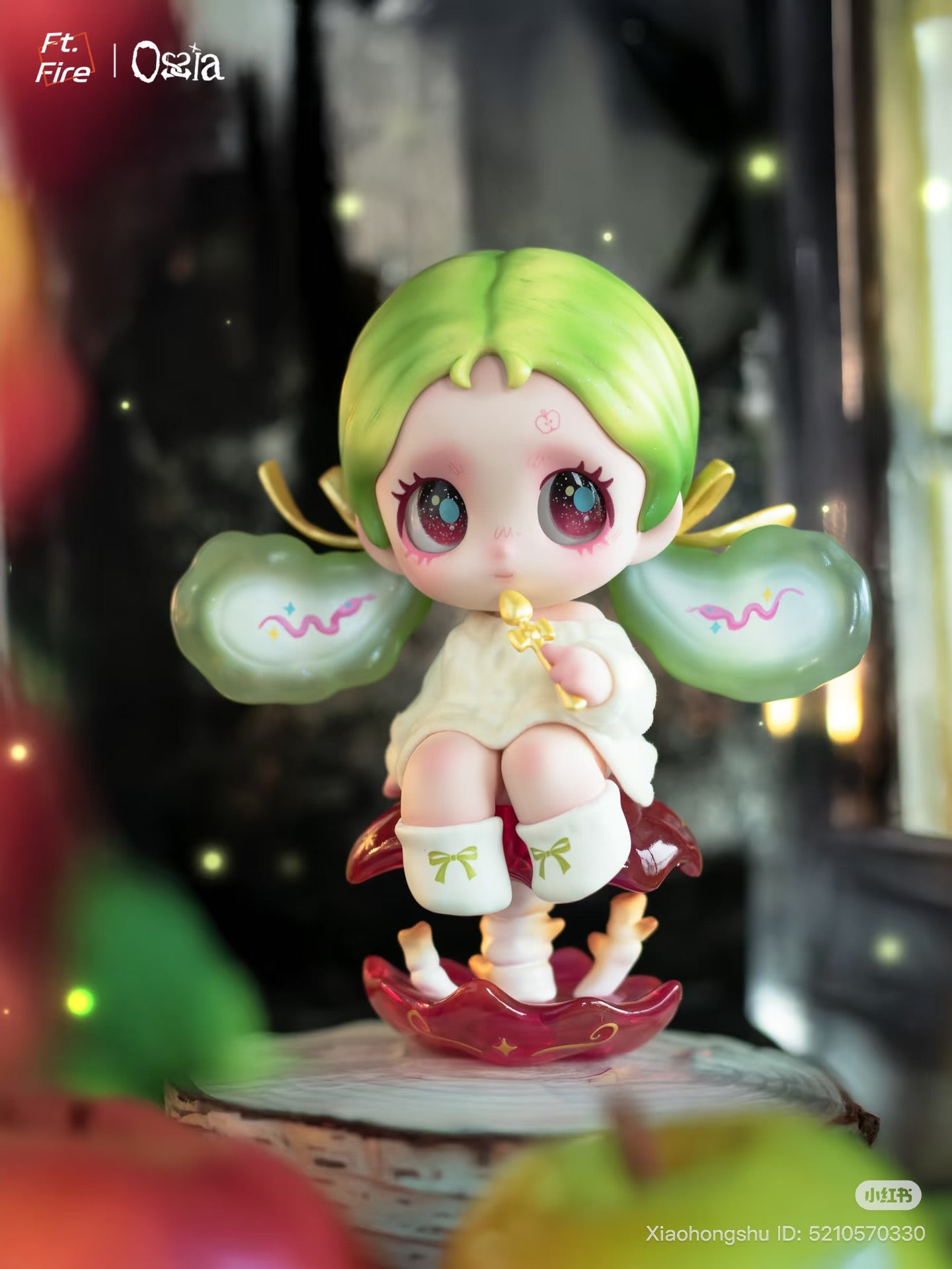 Chibi-style figurine from Ossia - Feel The World Series; green-haired fairy holding a golden key, seated on a mushroom base. Preorder available at Strangecat Toys.