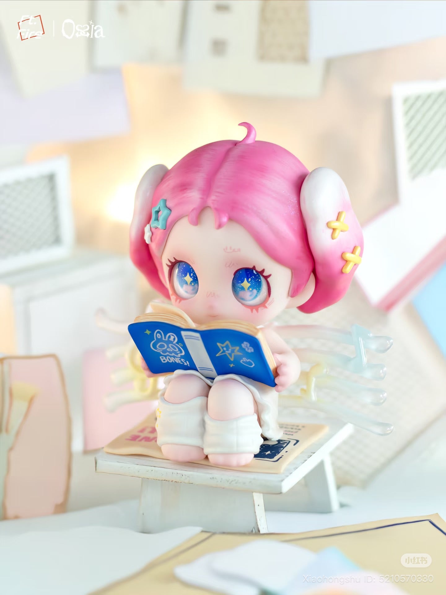 Chibi figurine with pink hair reading a BONES! book, surrounded by treble-clef notes. Part of Ossia - Feel The World Series Blind Box - Preorder.