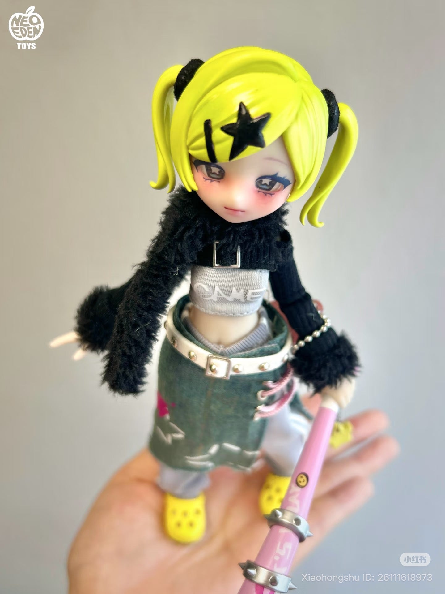 EVE LYNNA II Double Killer Series action figure with neon pigtails, fuzzy sweater, mini-skirt, and pink bat prop, available for preorder at Strangecat Toys.