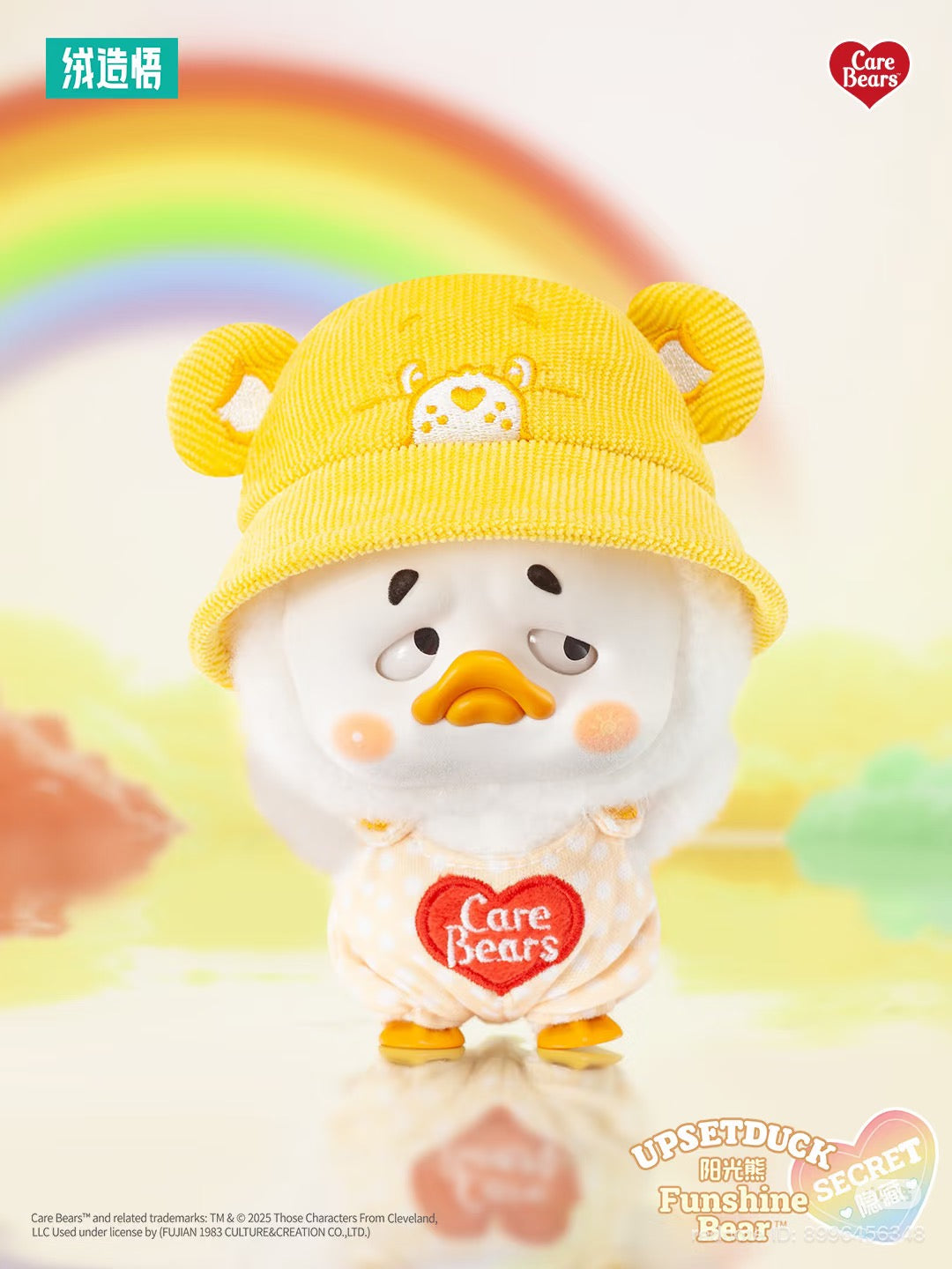 Care Bears x Upset Duck Be Rainbow Duck Plush Keychain features a pouty duck in Care Bears gear, part of a collectible blind box series.