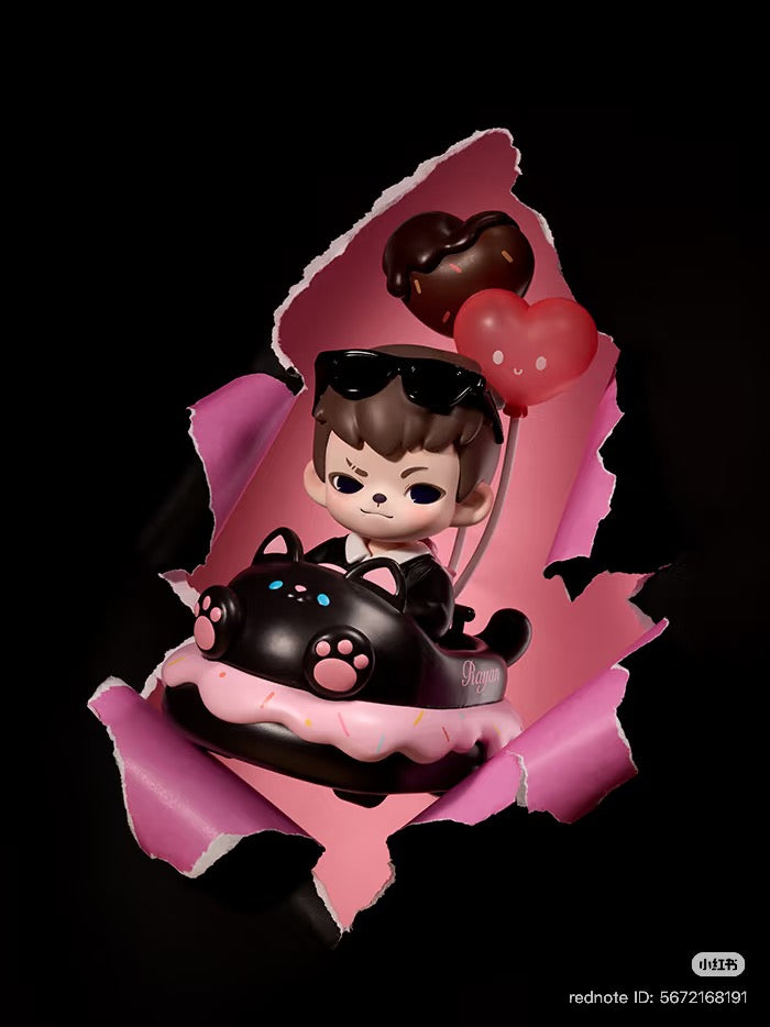 Rayan Let't Date Series figure: cartoon boy in cat-shaped donut car with heart balloons, part of a blind box collection available for preorder.