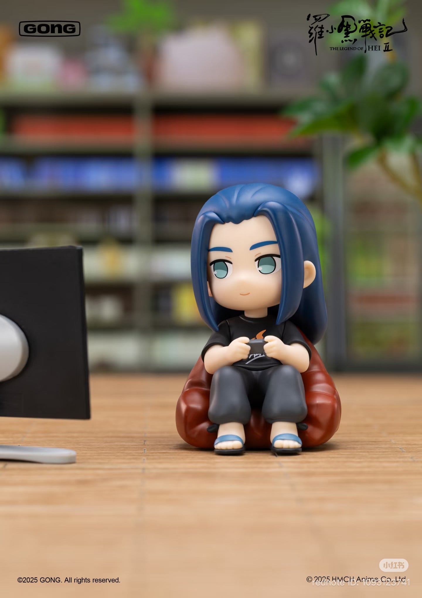 Chibi-style figure from The Legend of Luo Xiaohei 2 - Character Daily Life Series on a beanbag with controller, preordering available at Strangecat Toys.