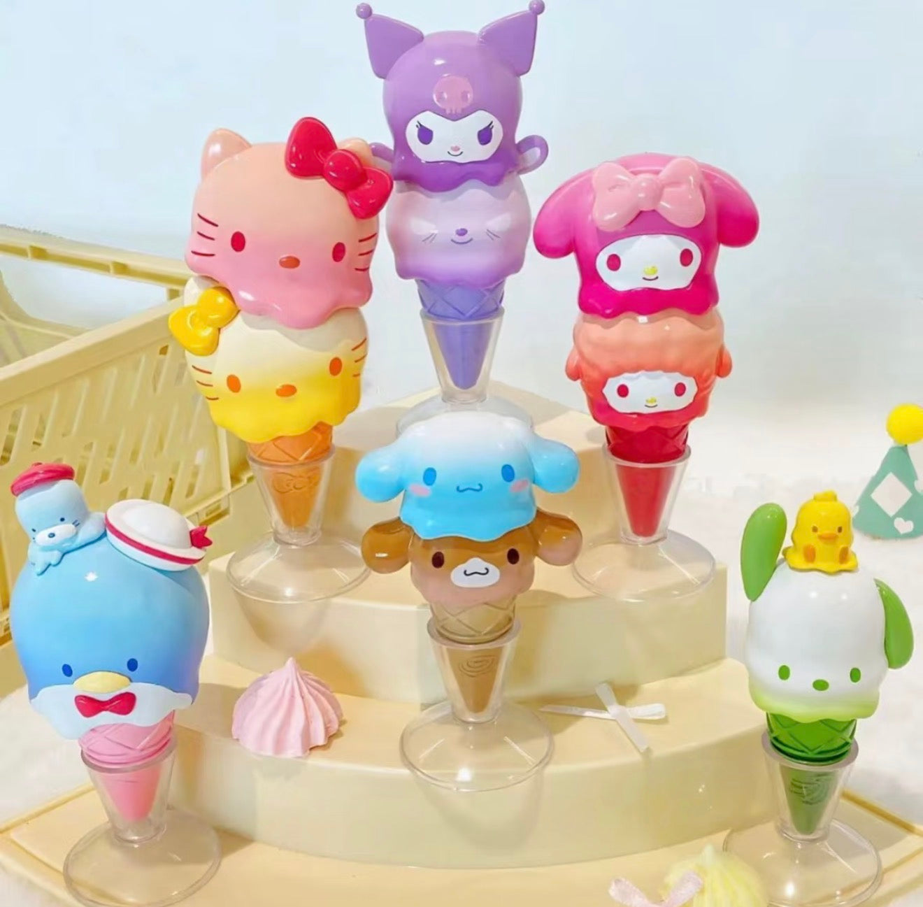 Sanrio Characters Melting Ice Cream Stacking Series Blind Box: pastel-colored toy cones featuring Hello Kitty, Kuromi, My Melody, Tuxedo Sam, Cinnamoroll, and Pochacco/Pompompurin figures.