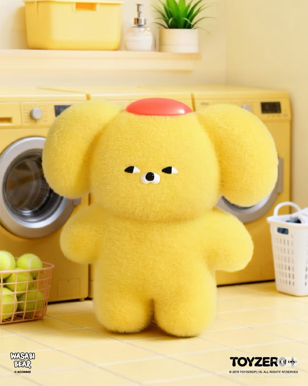Wasabi Bear Outing Pals Series Blind Box: A fuzzy yellow bear toy in a laundry room, featuring playful elements like a red cap and floppy ears.