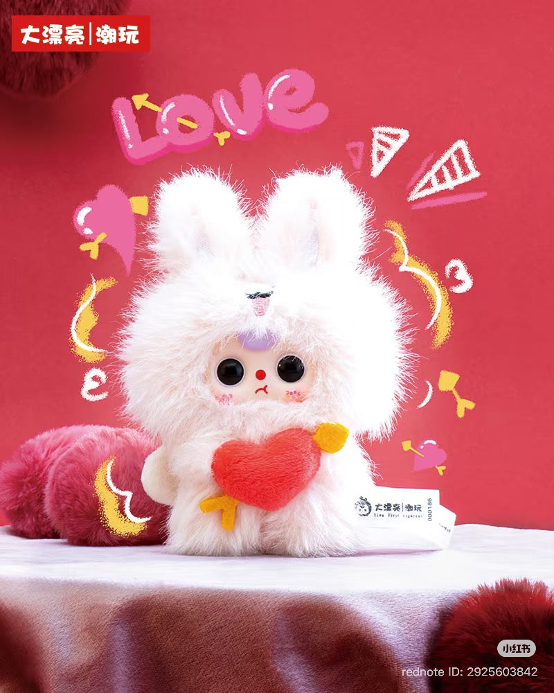 Baby Three - Cupid Plush Blind Box: A pastel-pink bunny toy with oversized eyes holding a red heart pillow, surrounded by love-themed doodles, featuring Chinese branding.