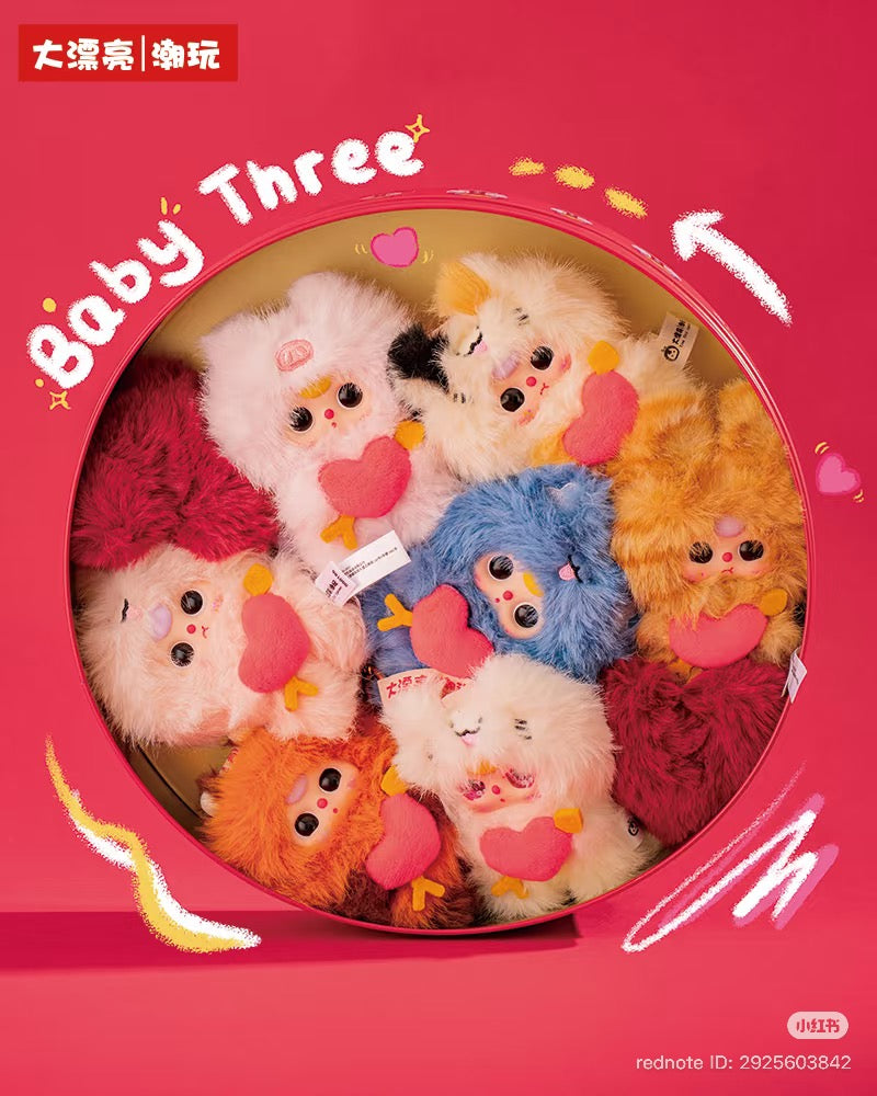 Baby Three - Cupid Plush Blind Box featuring eight plush critters with big eyes, rosy cheeks, and pink hearts, arranged in a round display tin.