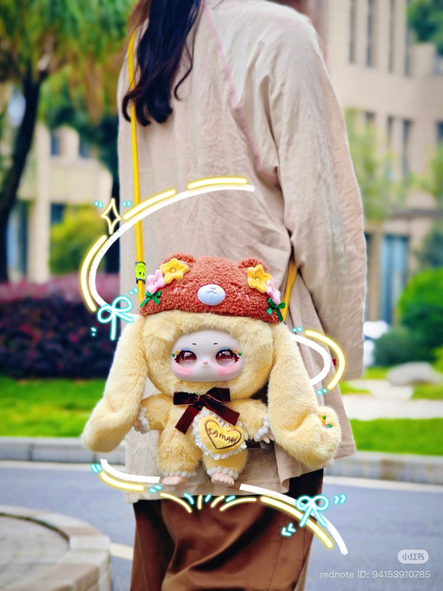 Samael Misty Garden 400% Plush Series Blind Box featuring a plush bunny bag with chibi eyes, long ears, bow, and floral hat, carried by a person outdoors.