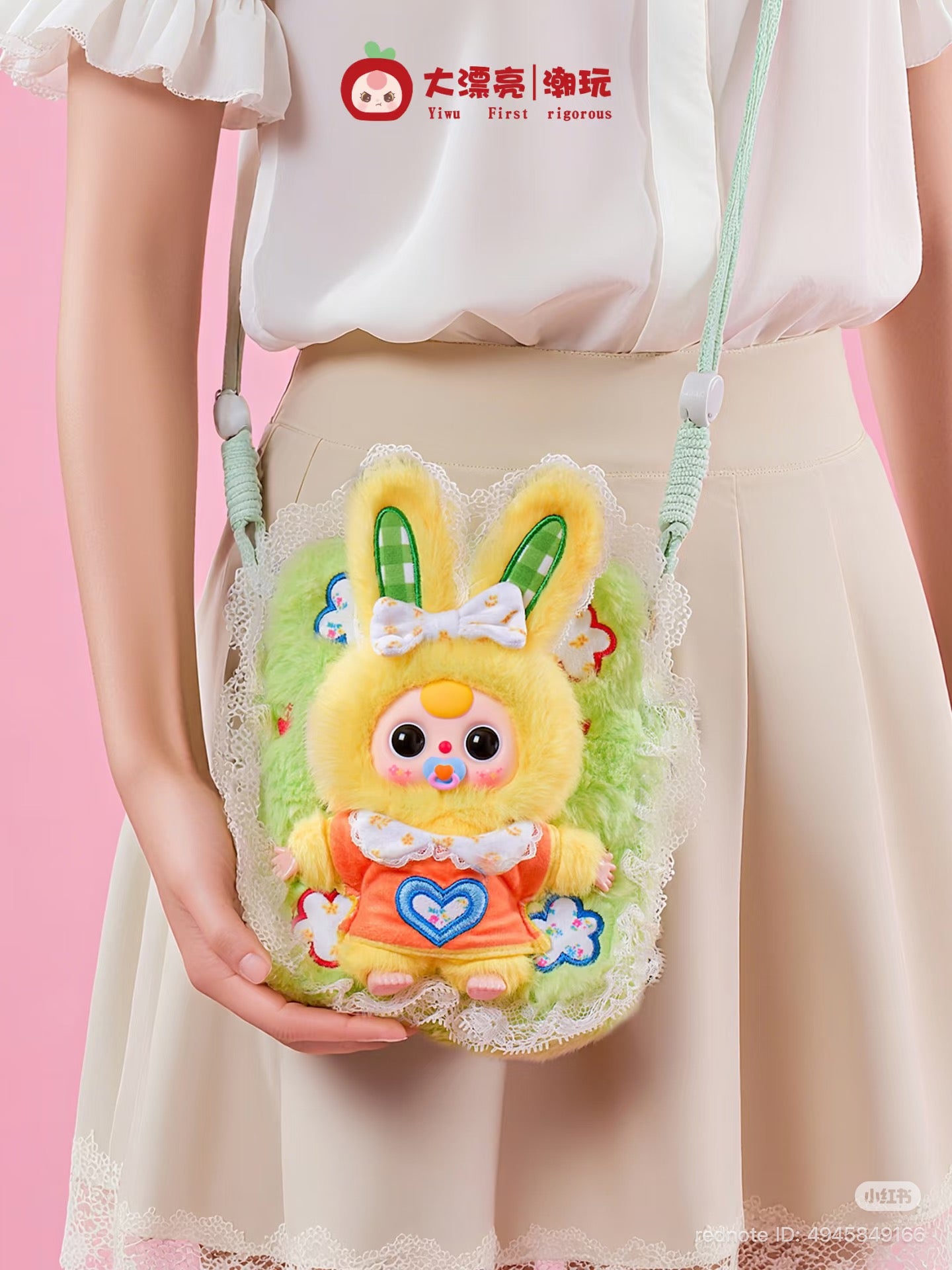 Baby Three Plush Travel Bag features a fluffy light green cross-body bag adorned with a plush bunny doll, perfect for art toy enthusiasts.